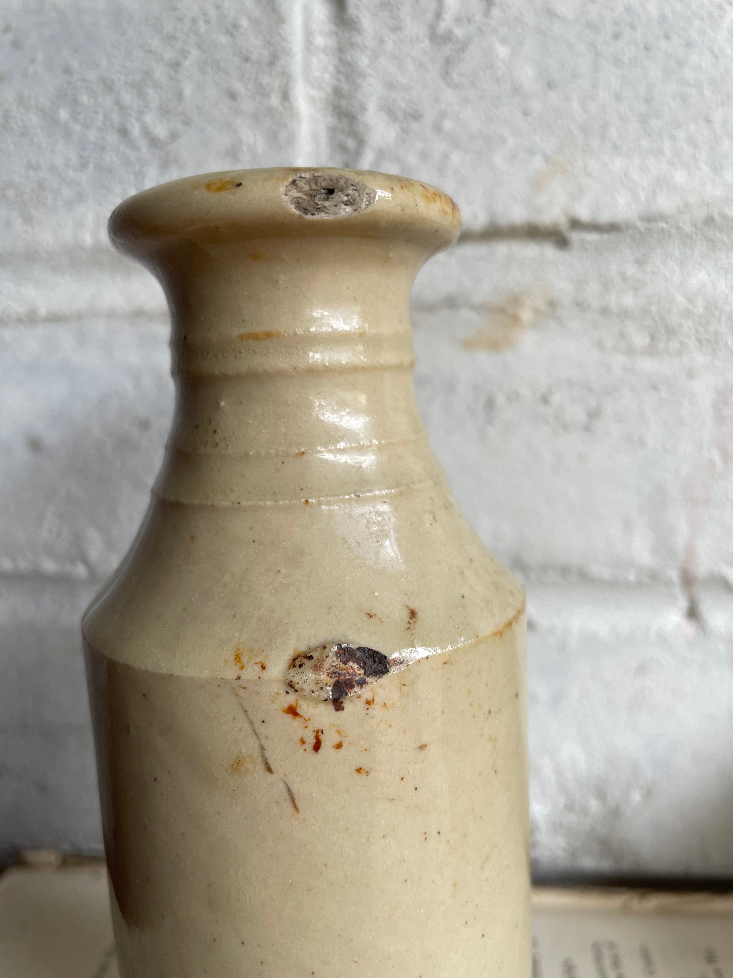 Trio of Antique Stoneware Bottles