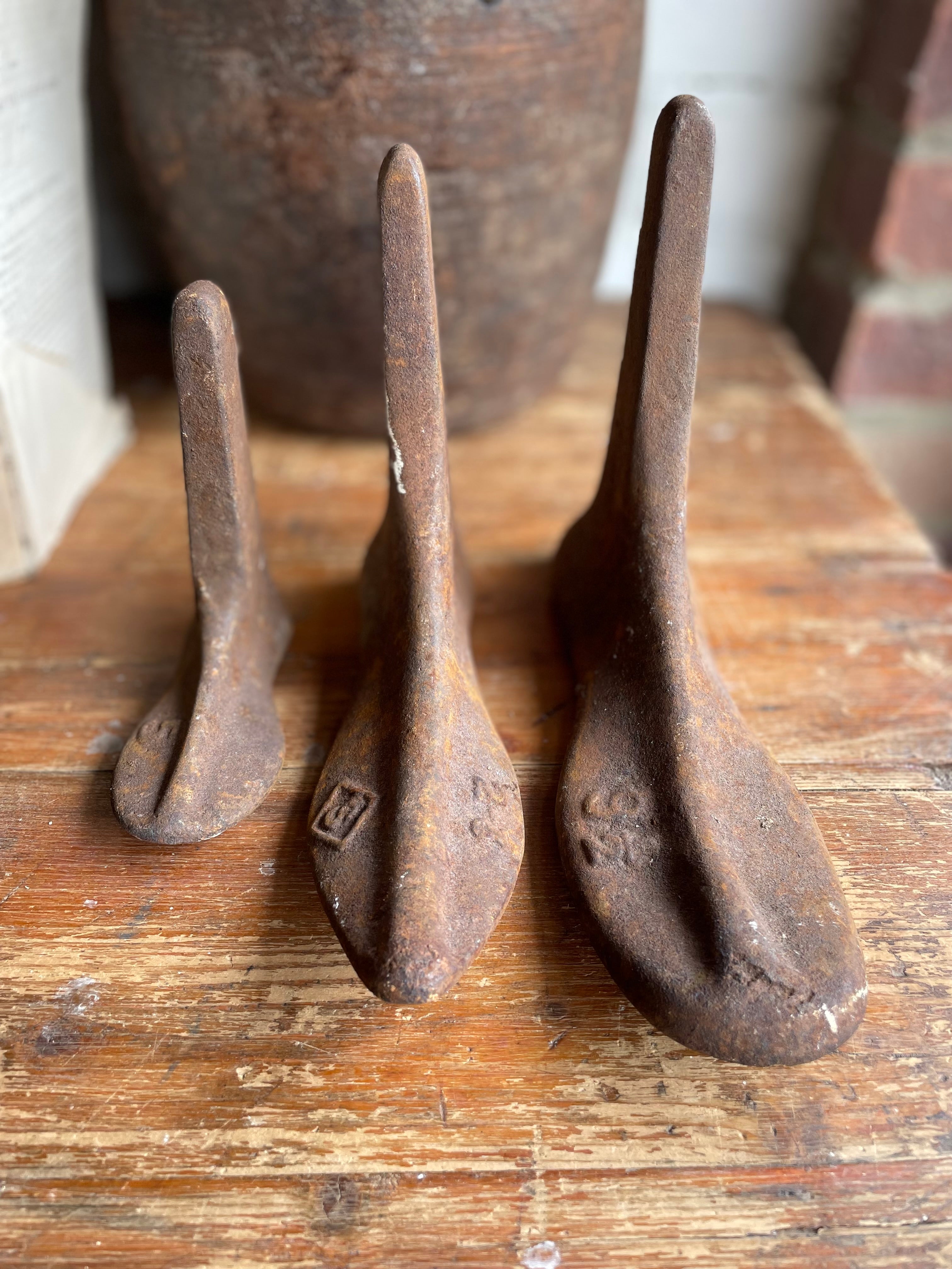 Trio of 19th century Cast Iron Cobblers Boots