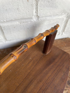 Midcentury wooden platter with bamboo handle