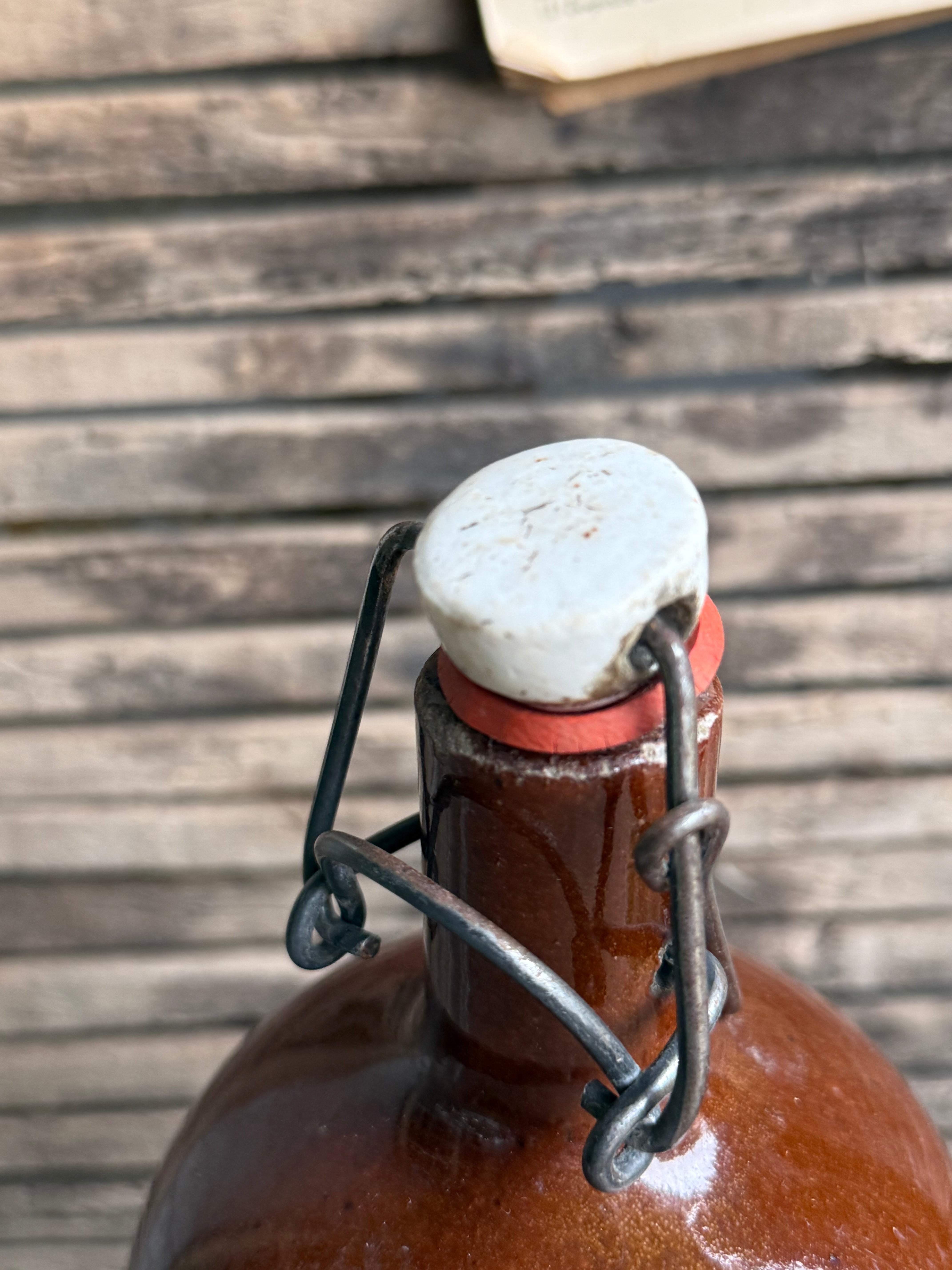 Trio of Stoneware Soda Bottles with Porcelain Swing Stoppers