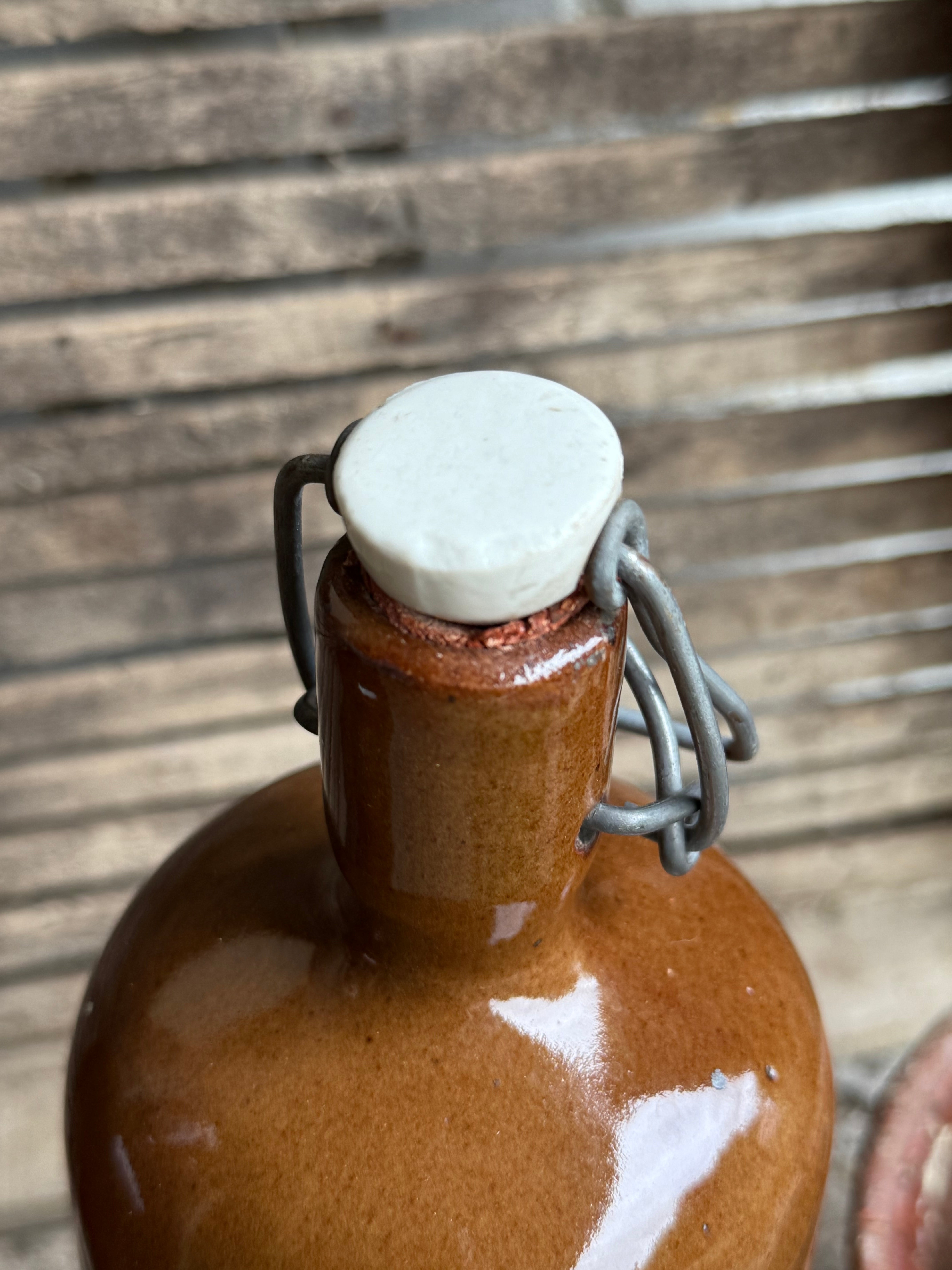 Trio of Stoneware Soda Bottles with Porcelain Swing Stoppers