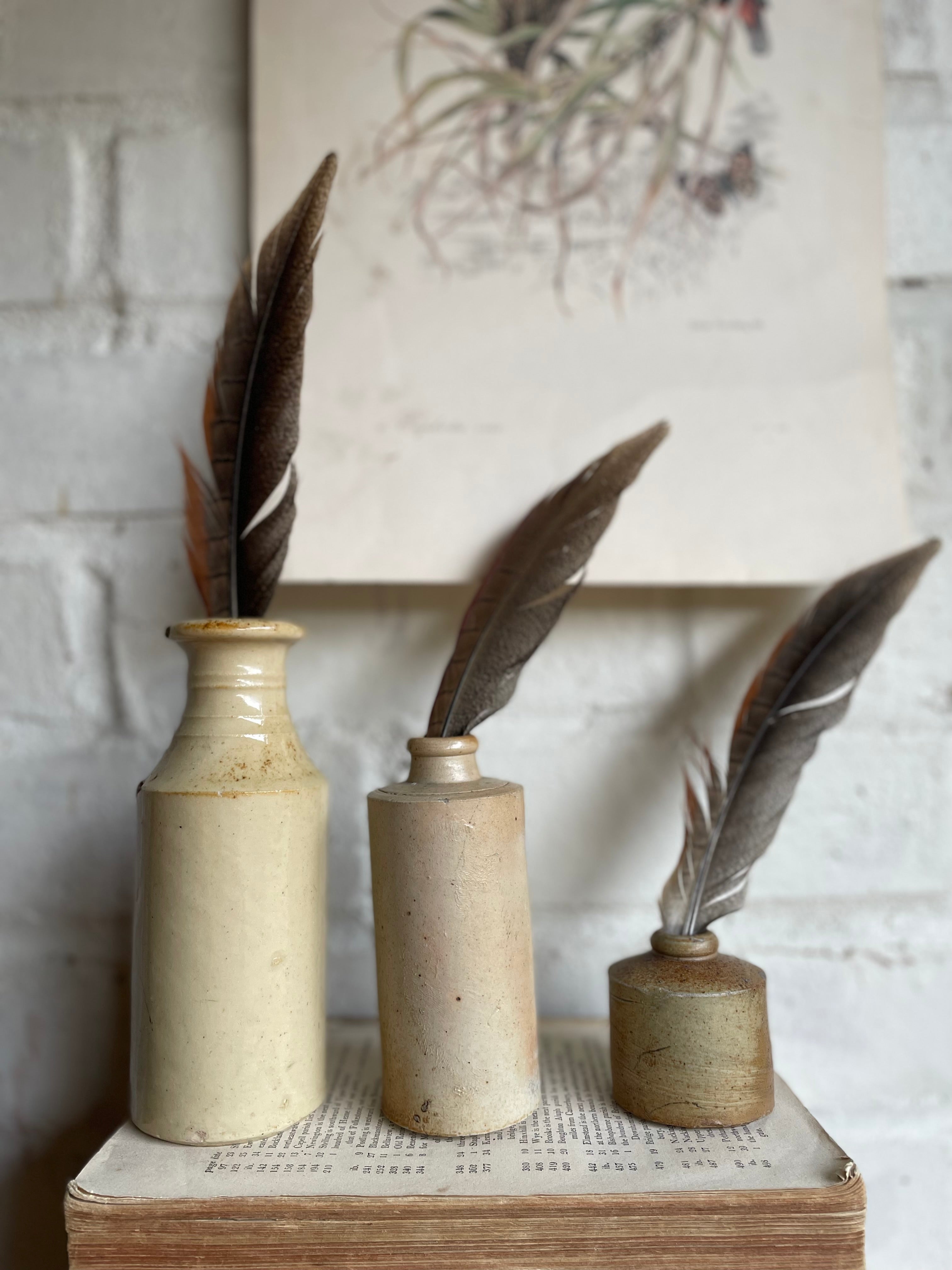 Trio of Antique Stoneware Bottles