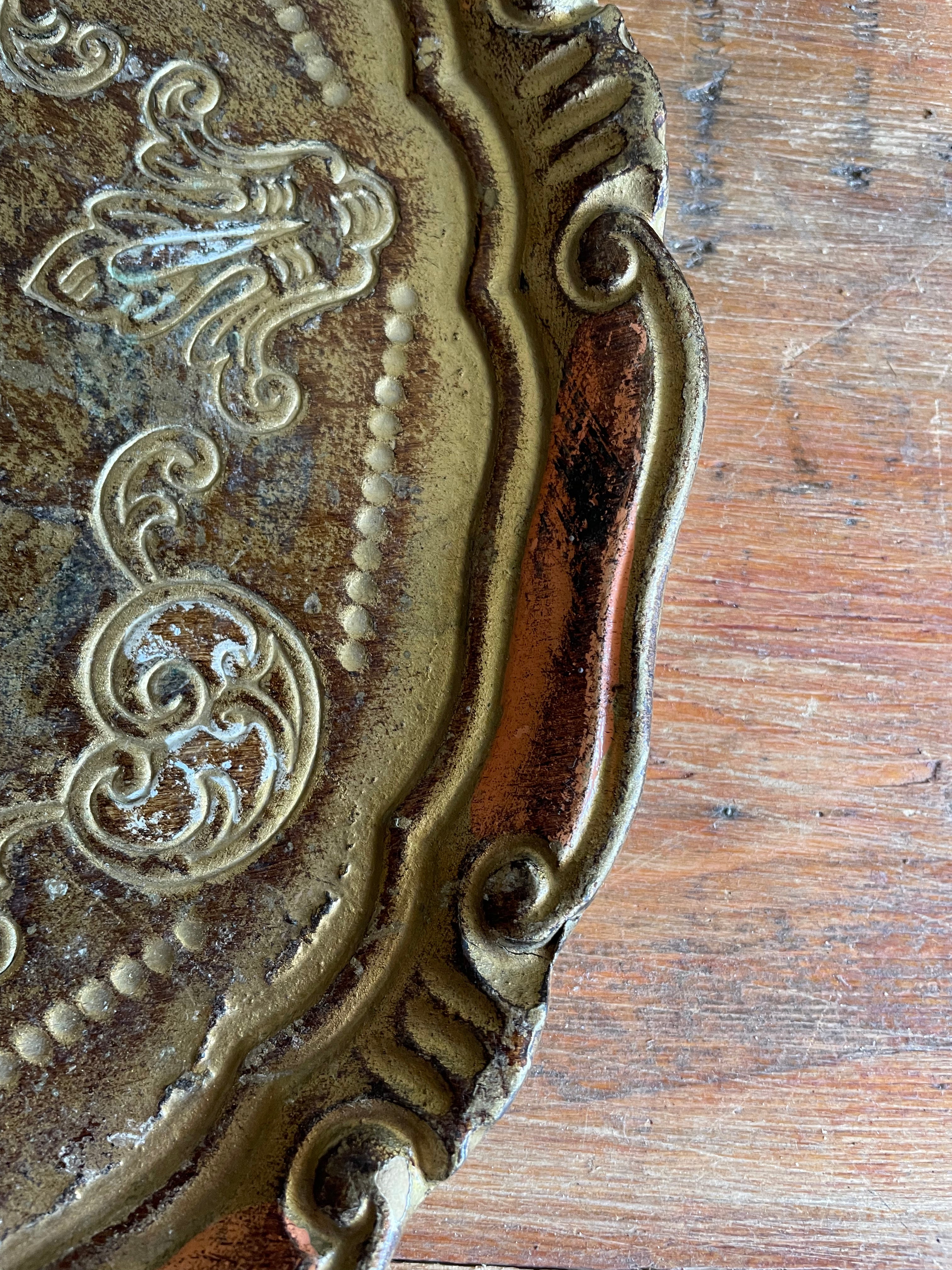 Round Gold Florentine Tray with orange hues