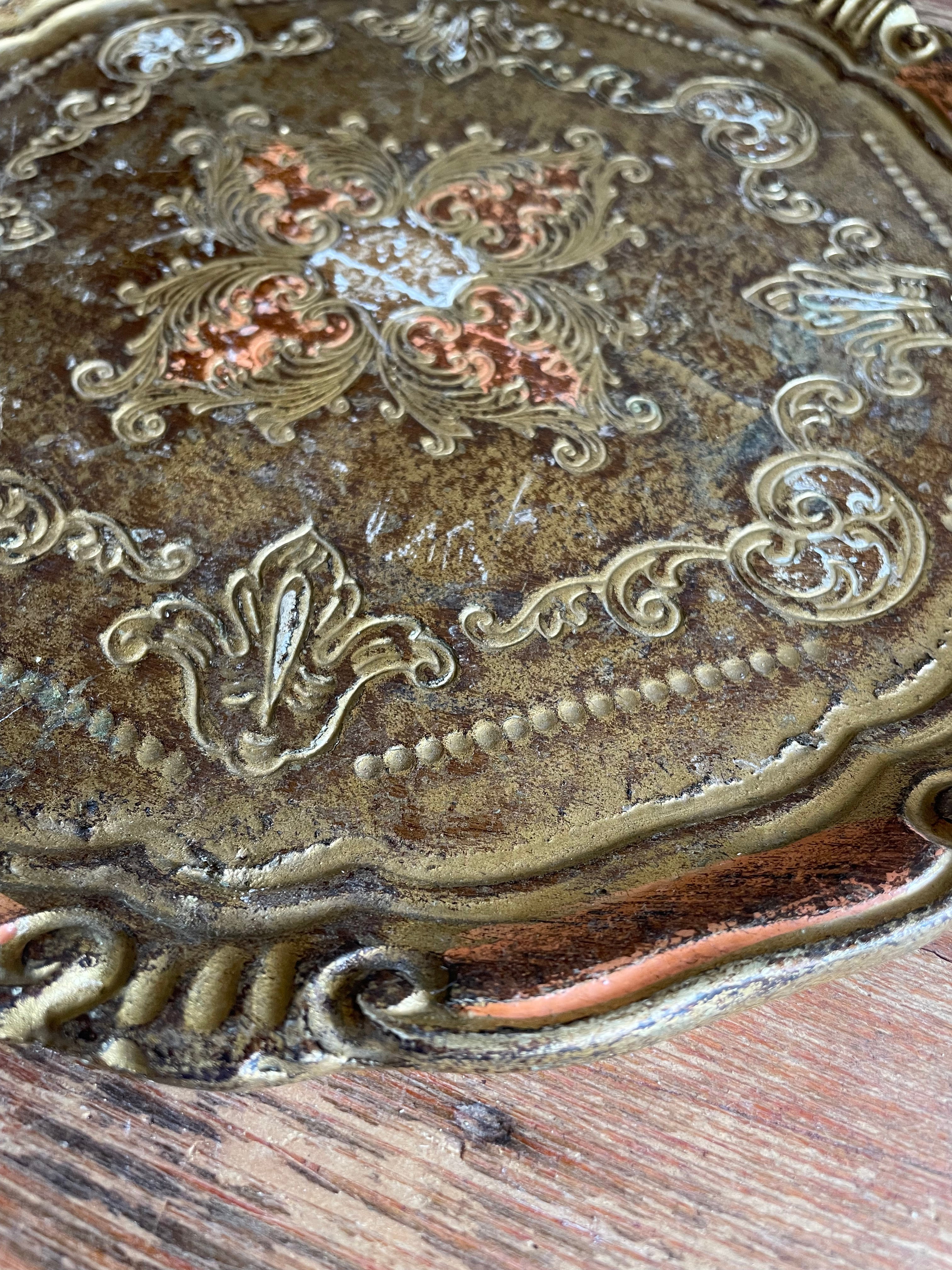 Round Gold Florentine Tray with orange hues