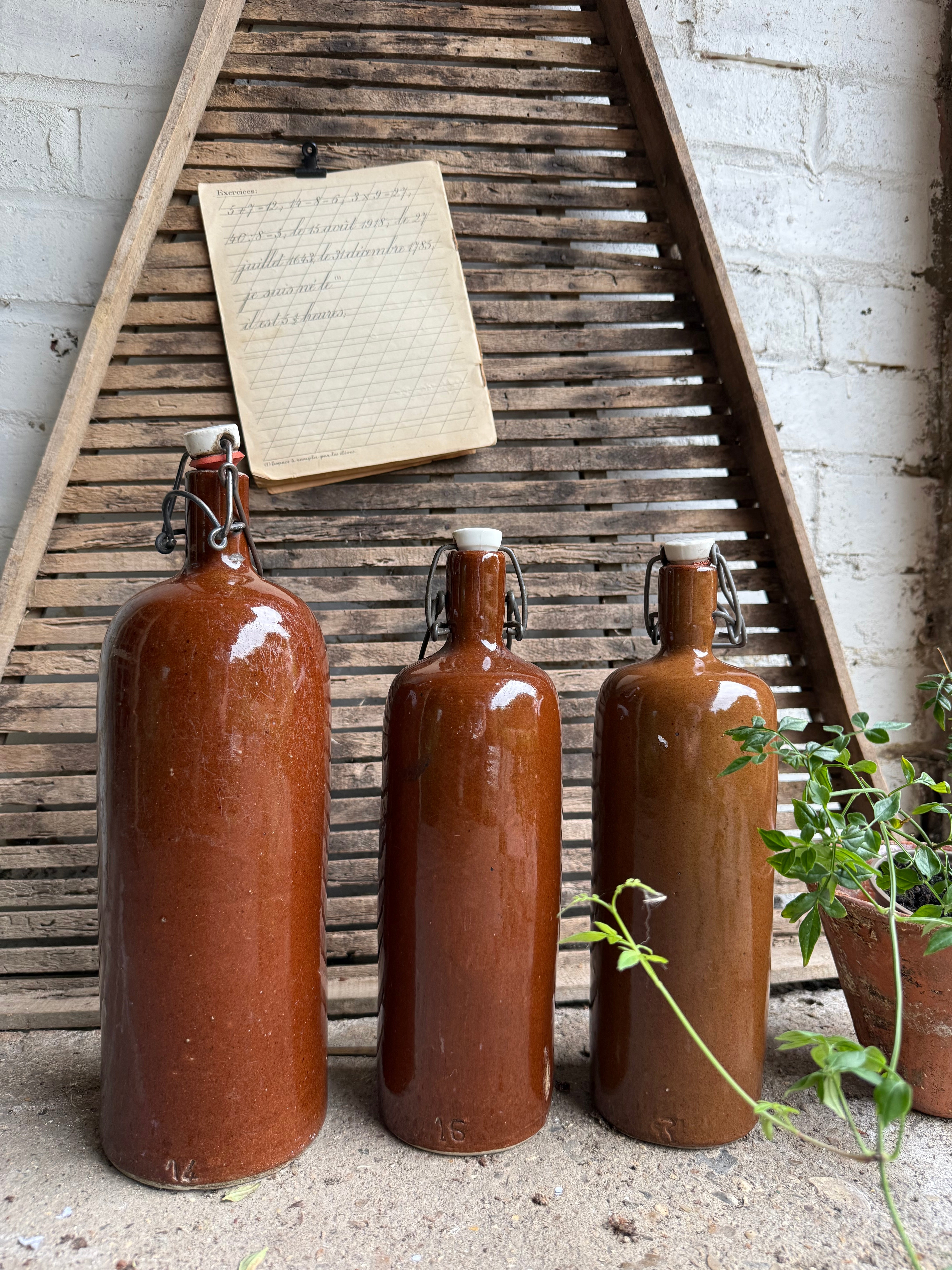 Trio of Stoneware Soda Bottles with Porcelain Swing Stoppers