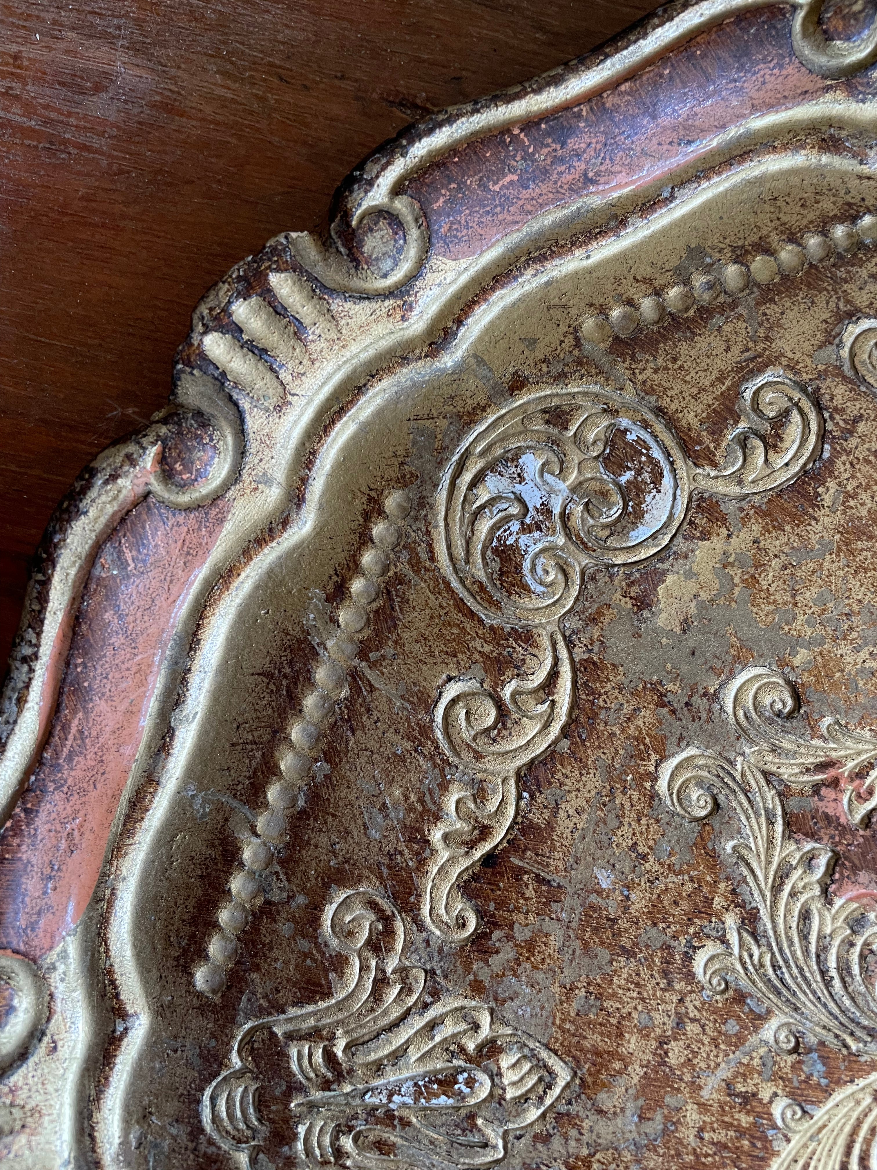 Round Gold Florentine Tray with orange hues