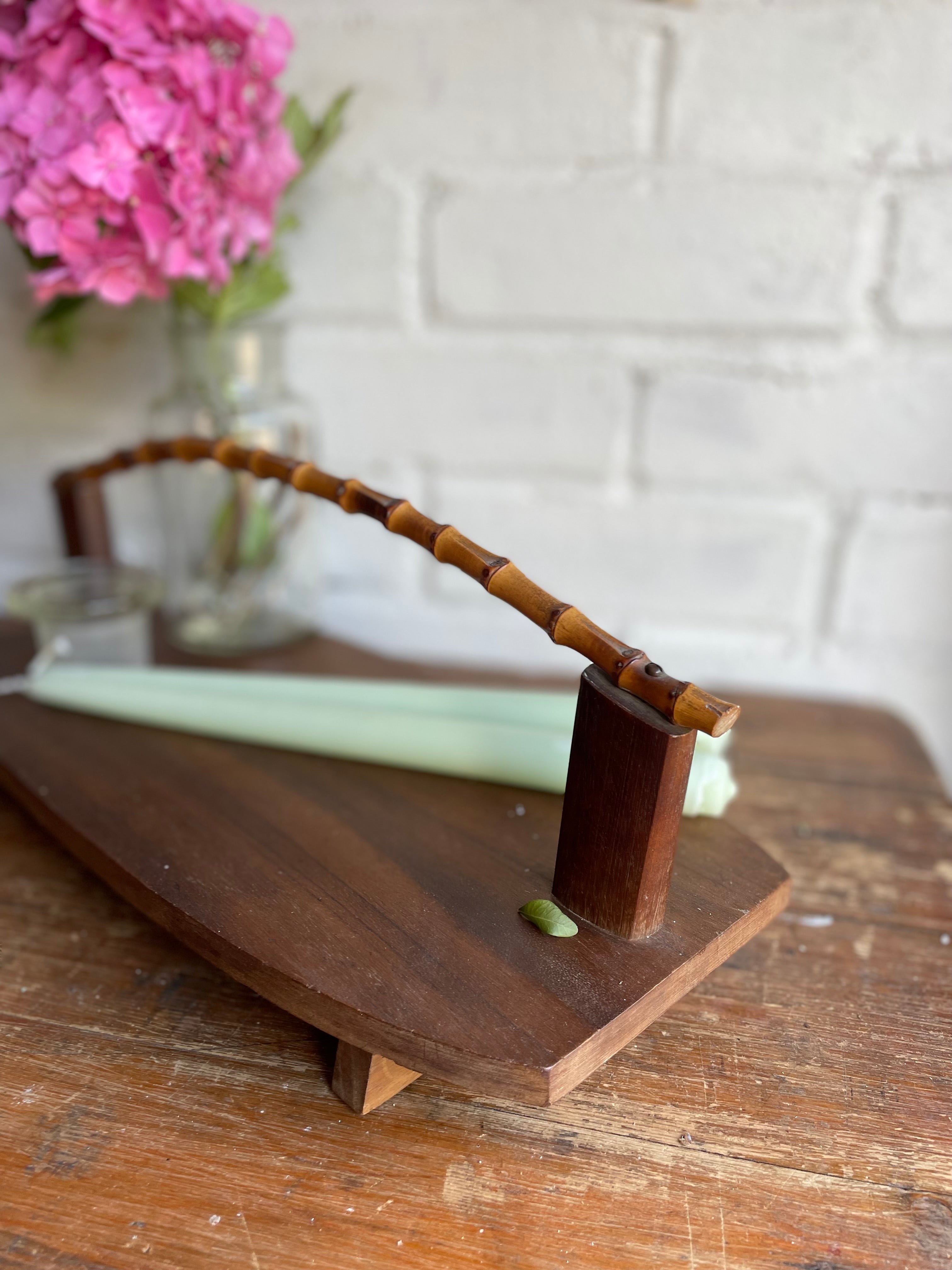 Midcentury wooden platter with bamboo handle