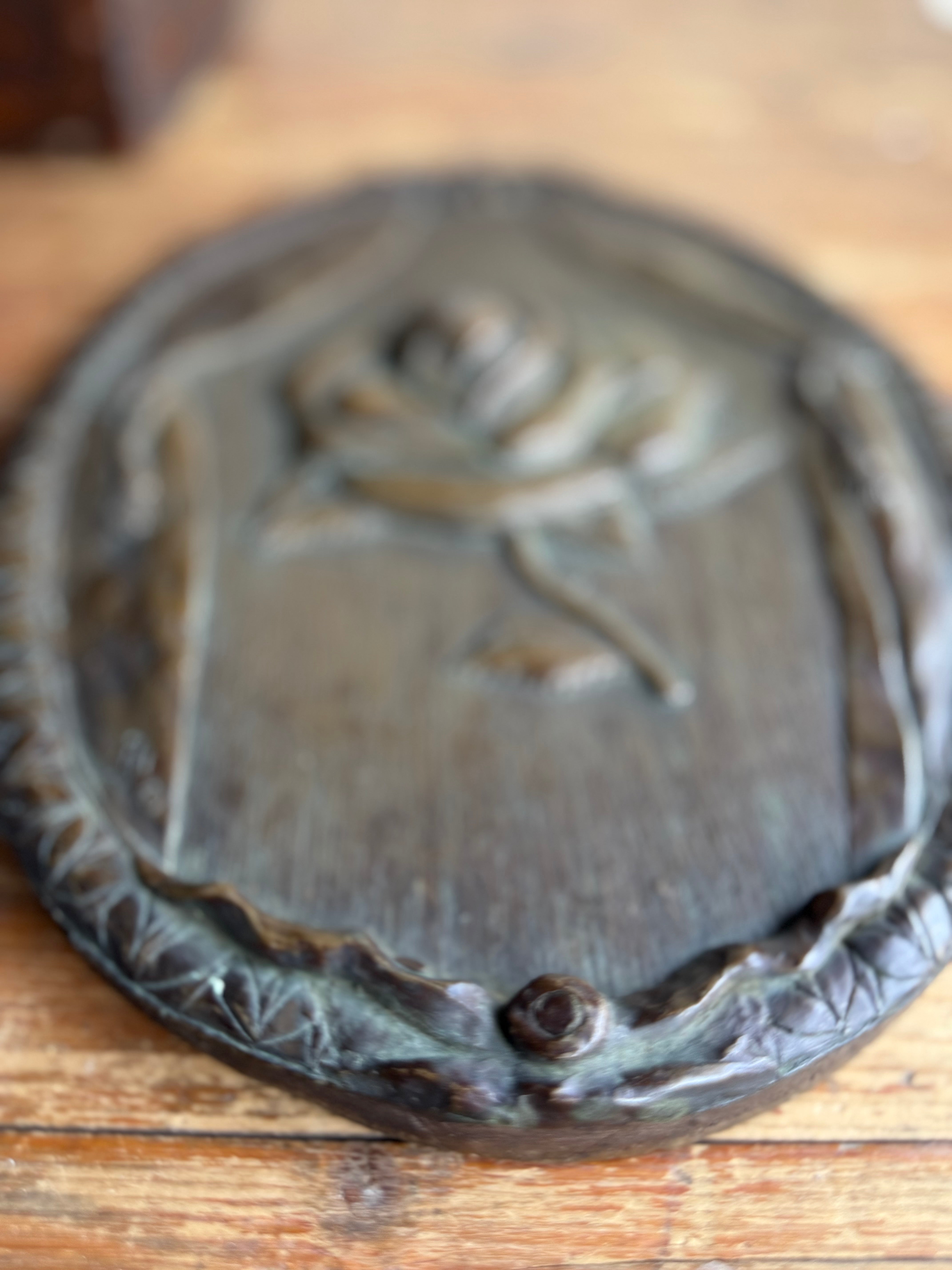 Rose Revealed: 19th Century Wood, Iron and Resin Plaque