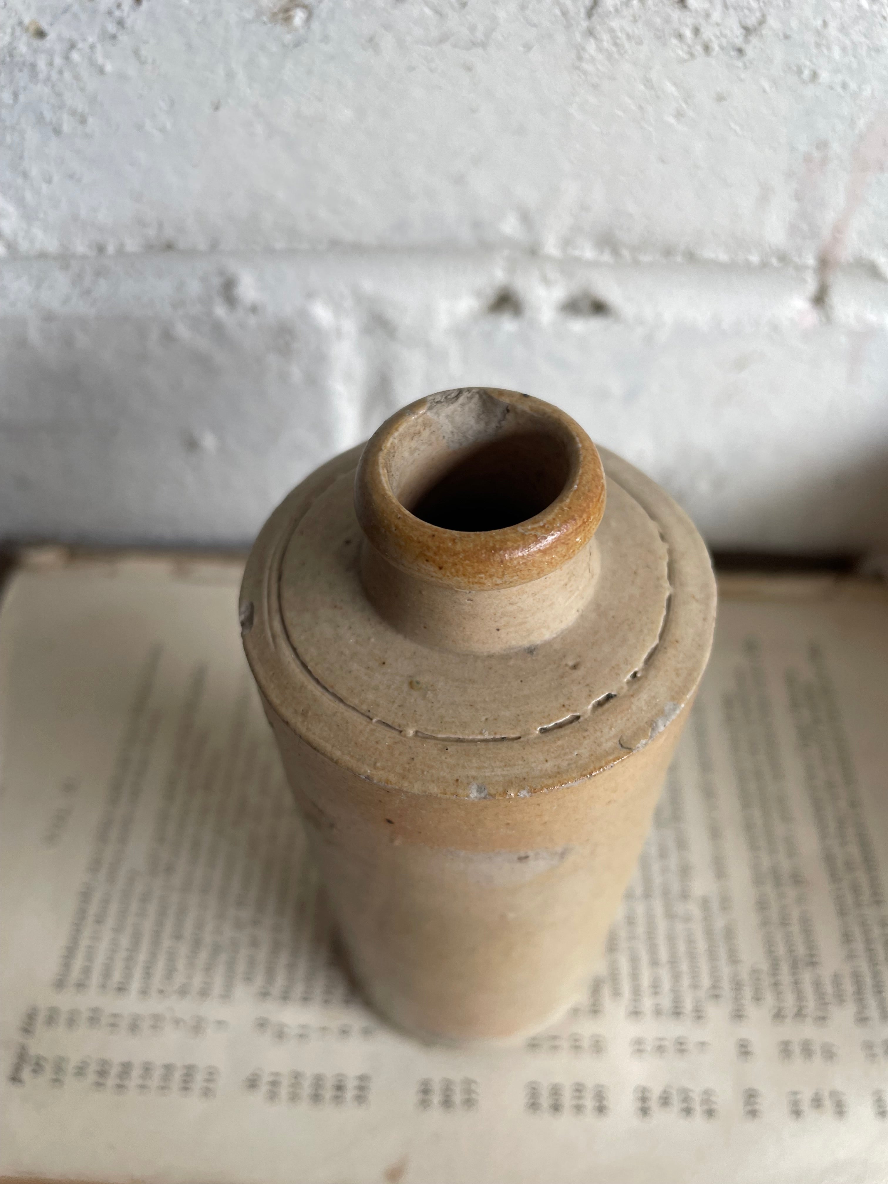Trio of Antique Stoneware Bottles