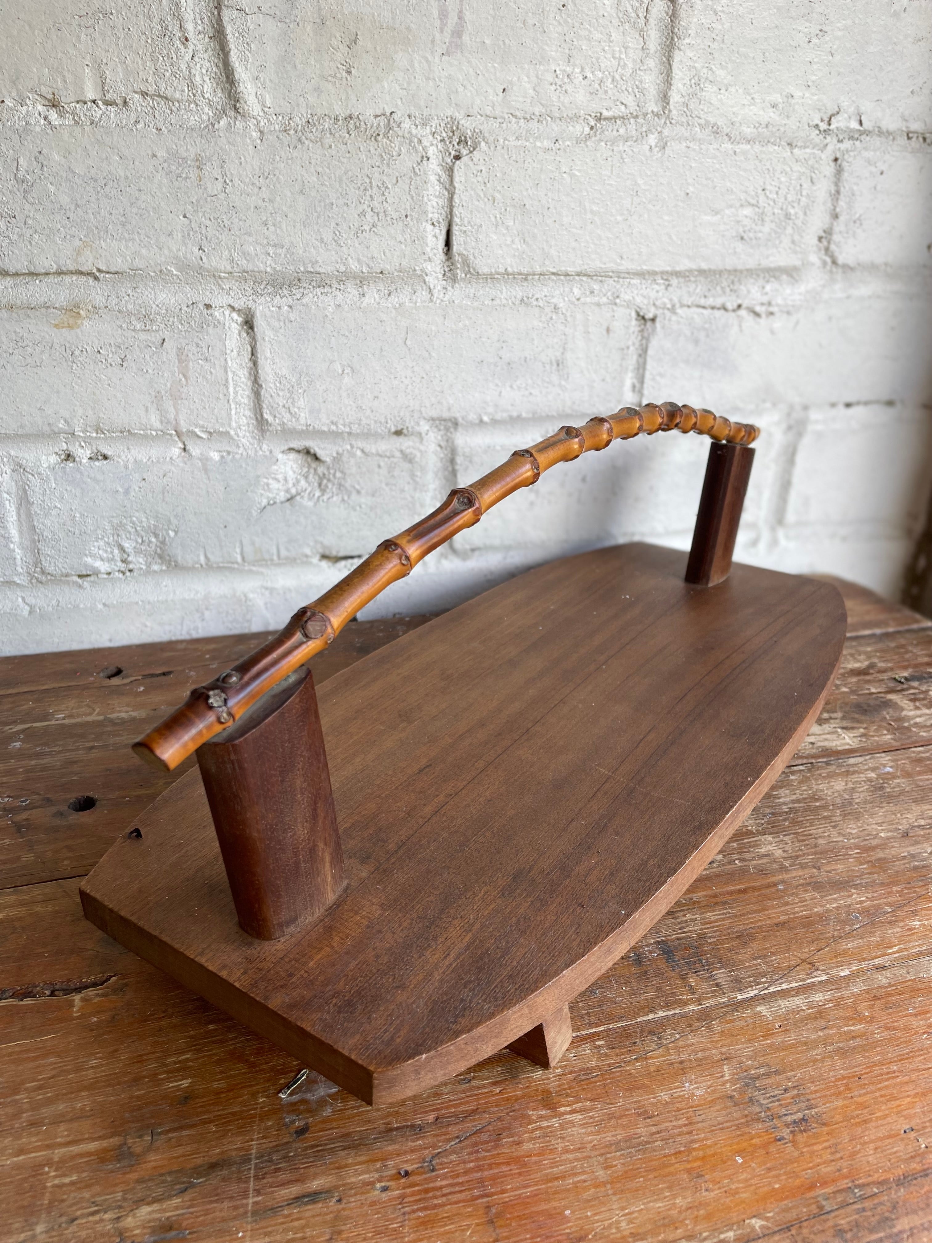 Midcentury wooden platter with bamboo handle