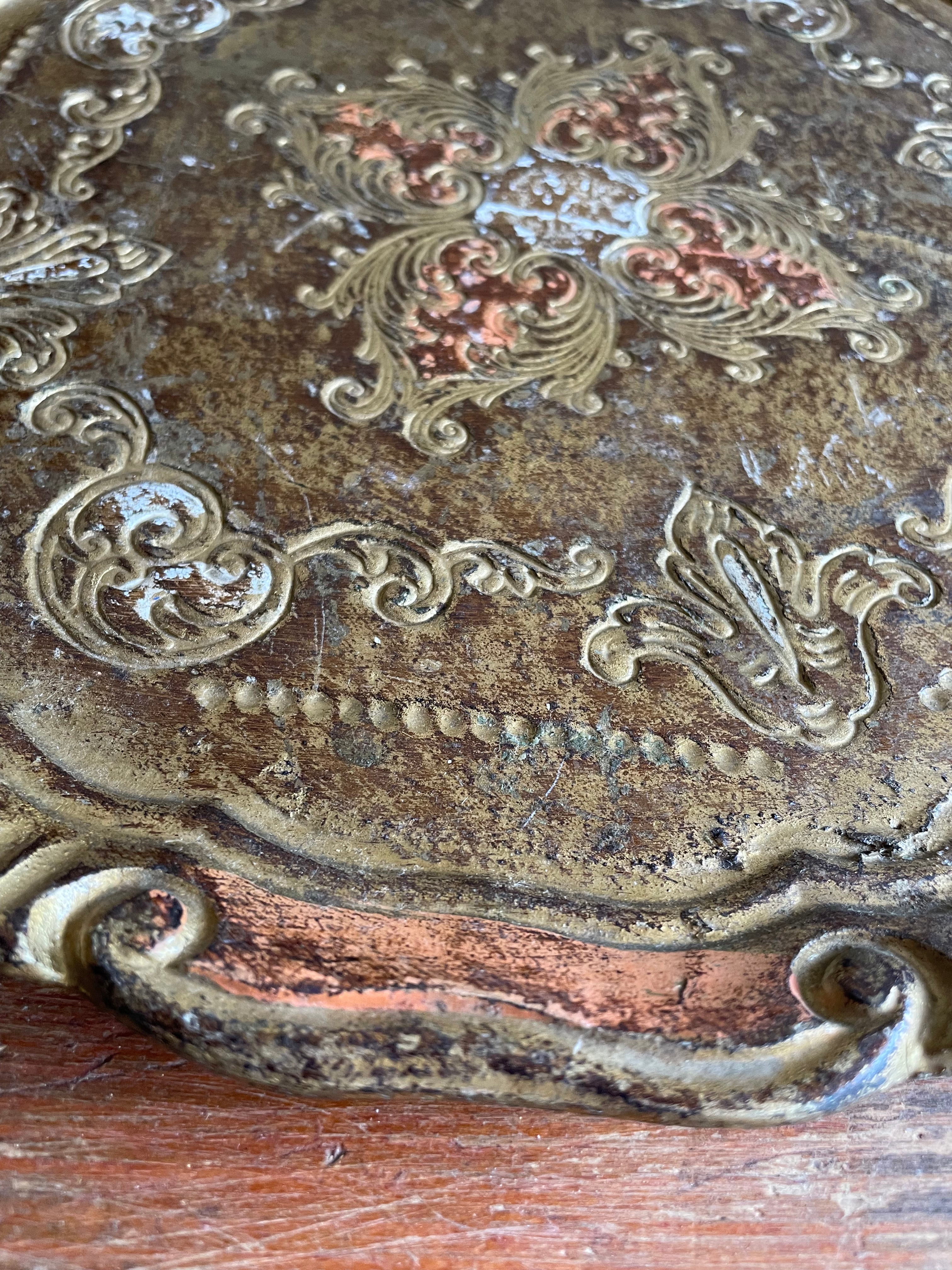 Round Gold Florentine Tray with orange hues