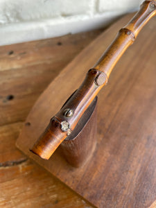 Midcentury wooden platter with bamboo handle