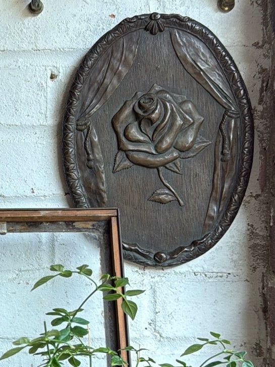Rose Revealed: 19th Century Wood, Iron and Resin Plaque