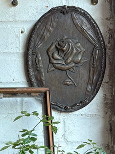 Rose Revealed: 19th Century Wood, Iron and Resin Plaque