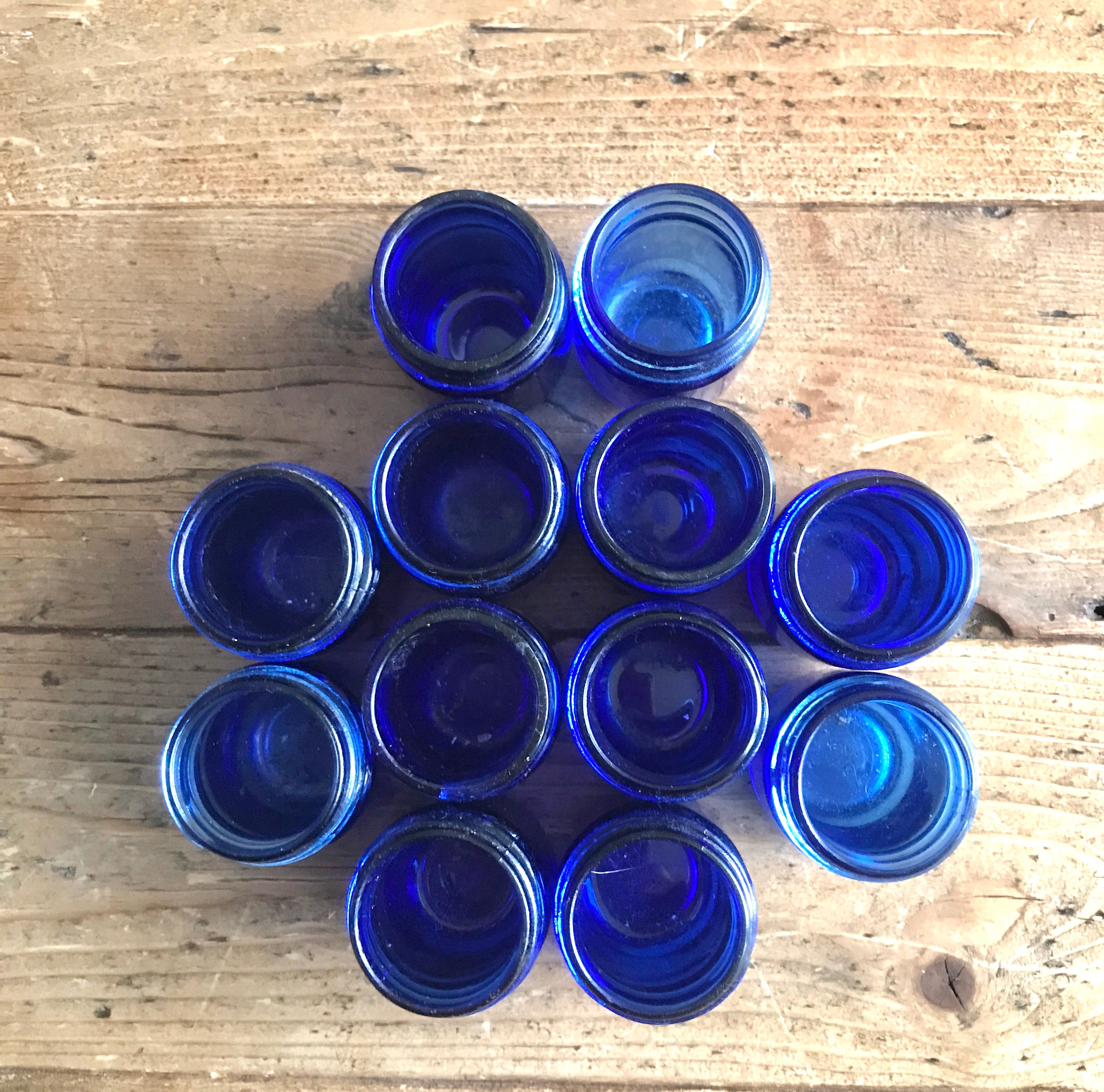 Collection of 12 Vintage Cobalt Blue Glass Vicks Jars