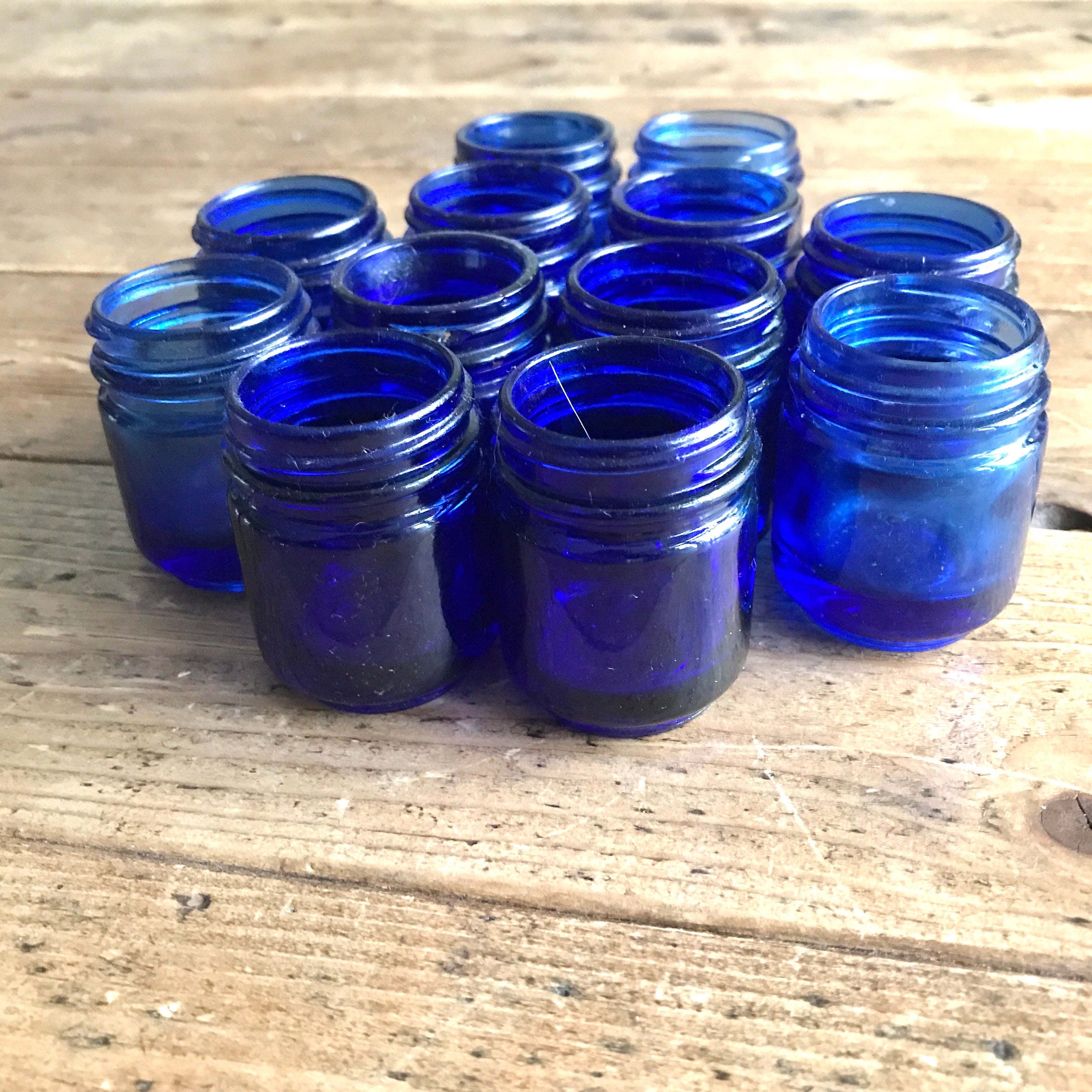 Collection of 12 Vintage Cobalt Blue Glass Vicks Jars