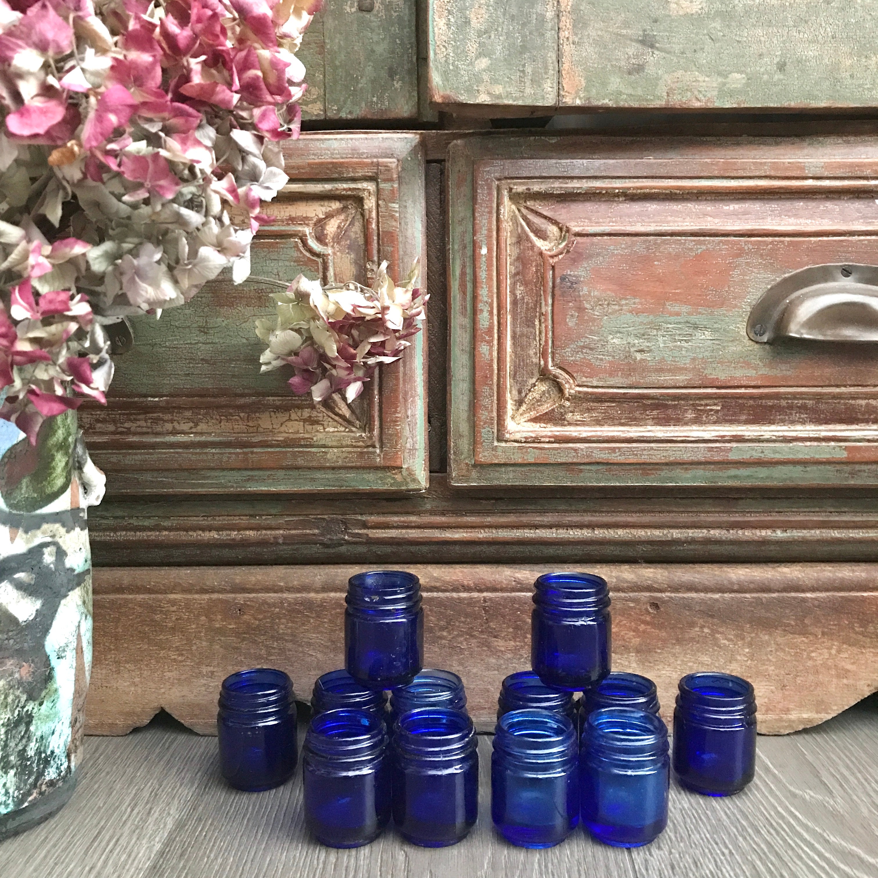 Collection of 12 Vintage Cobalt Blue Glass Vicks Jars