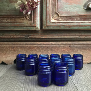 Collection of 12 Vintage Cobalt Blue Glass Vicks Jars