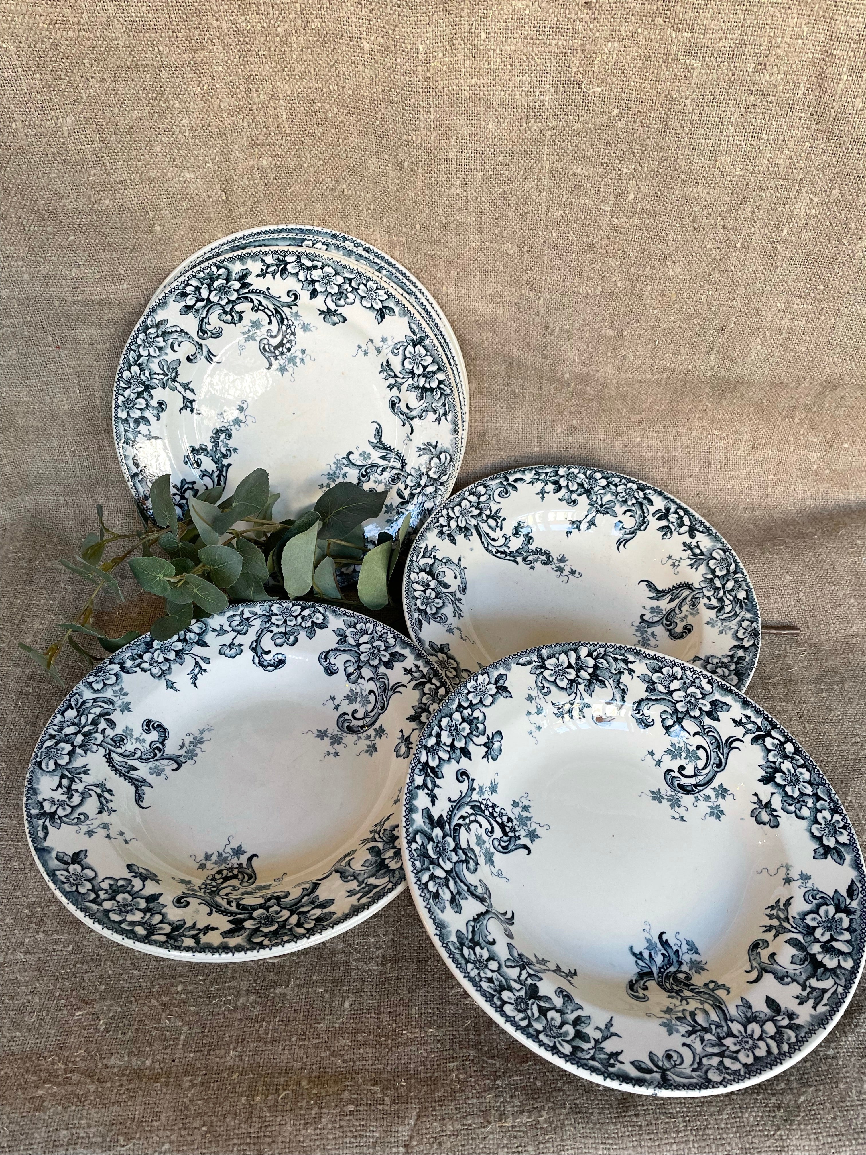 Set of four French “Wild Rose” Terre de Fer Side Plates and Bowls