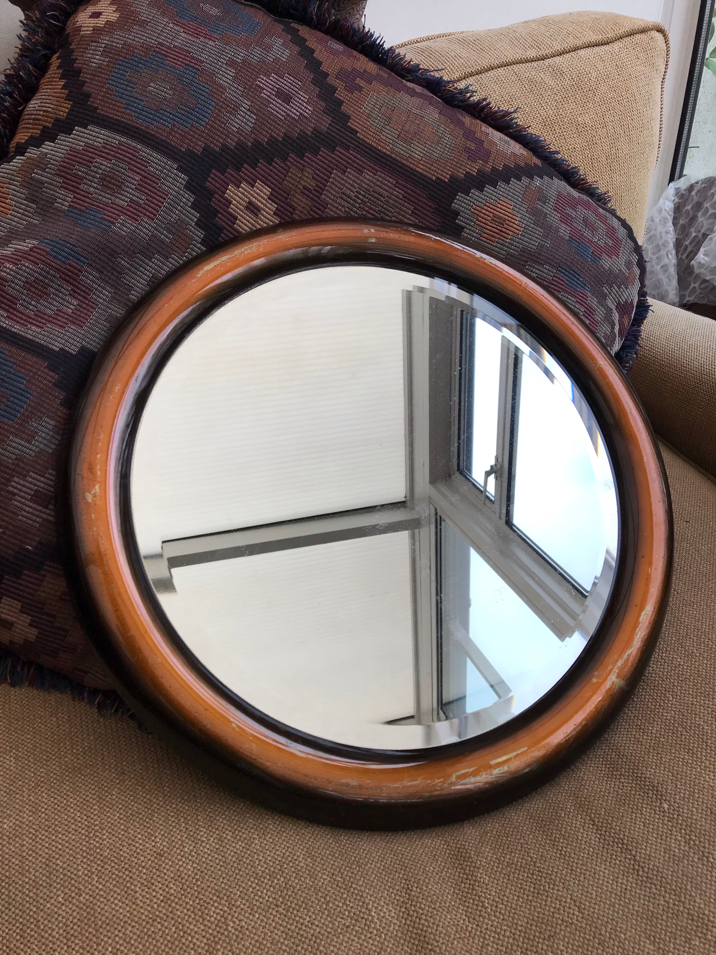 Bronze-coloured metal framed mirror