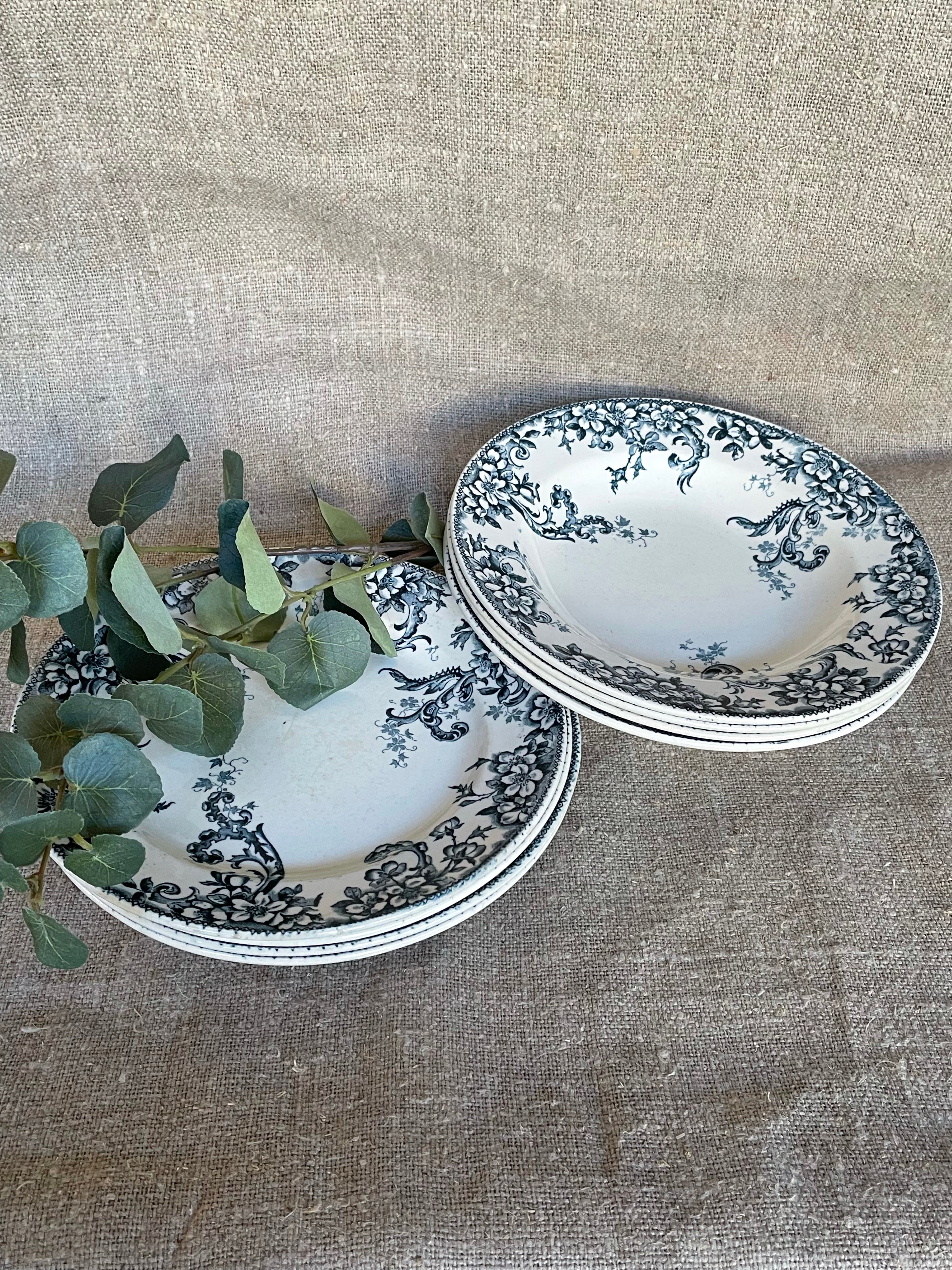 Set of four French “Wild Rose” Terre de Fer Side Plates and Bowls