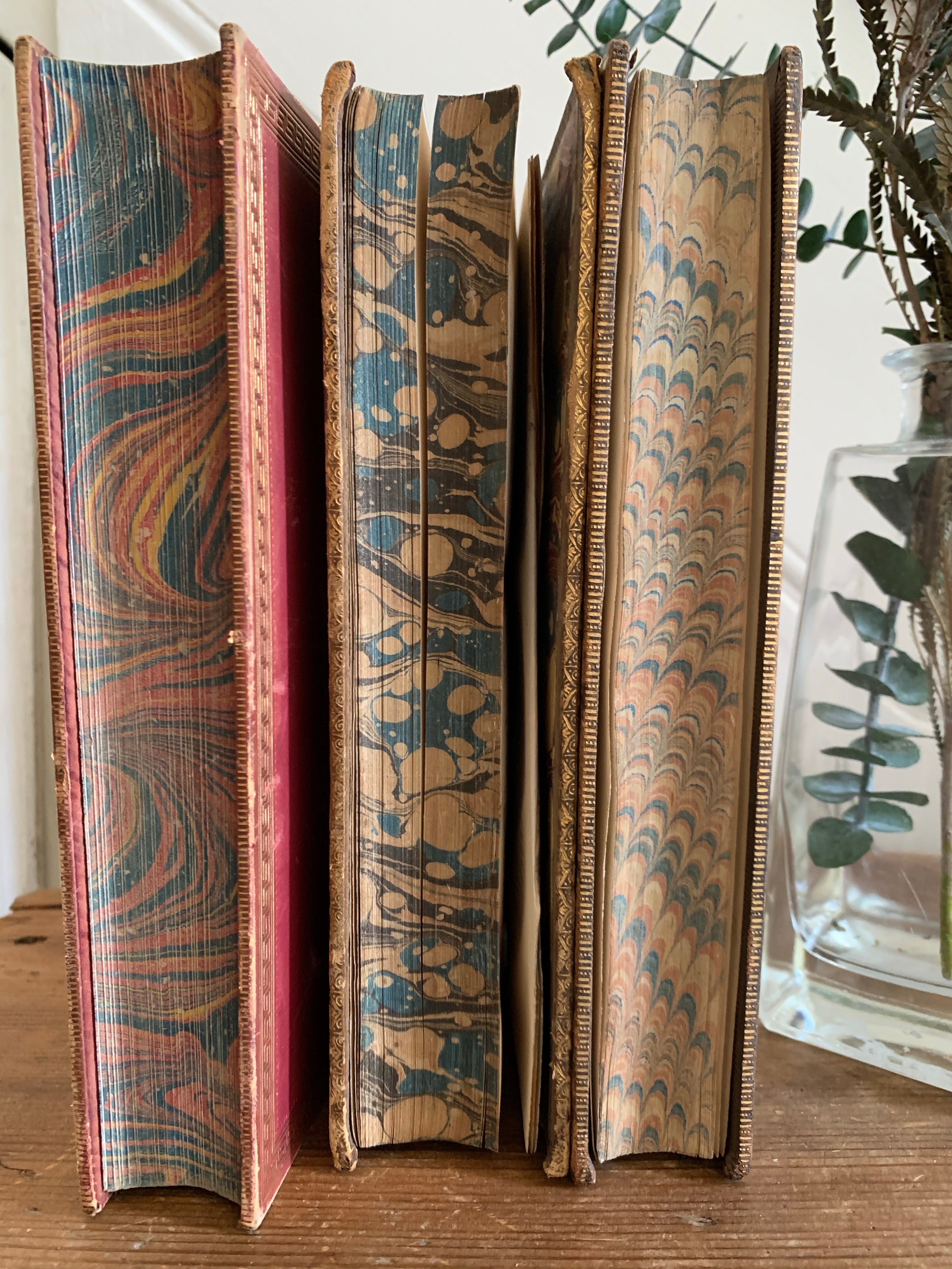 Trio of Old Marbled Books with Leather Spines