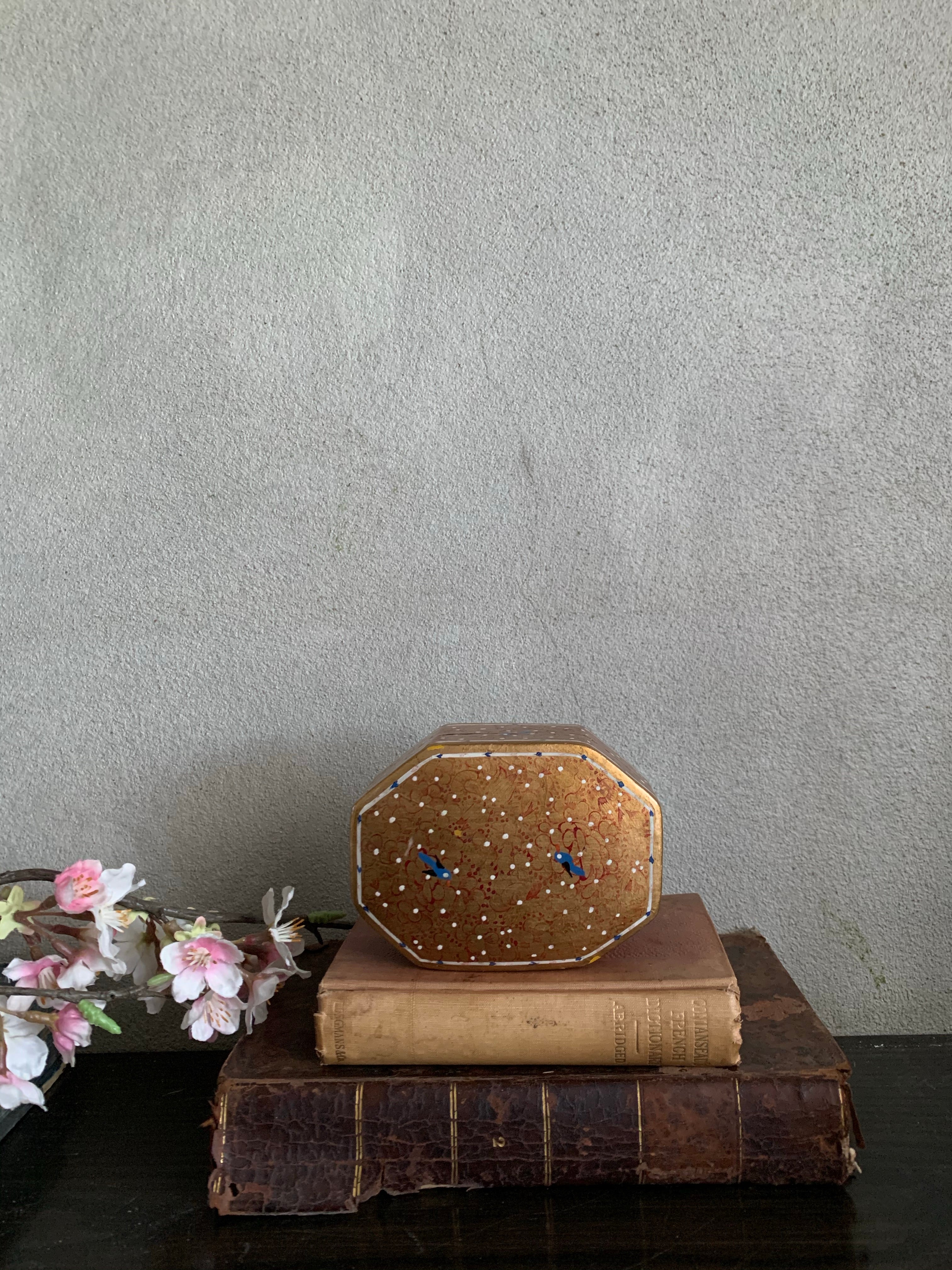 Little gold paper mache box with bird detail