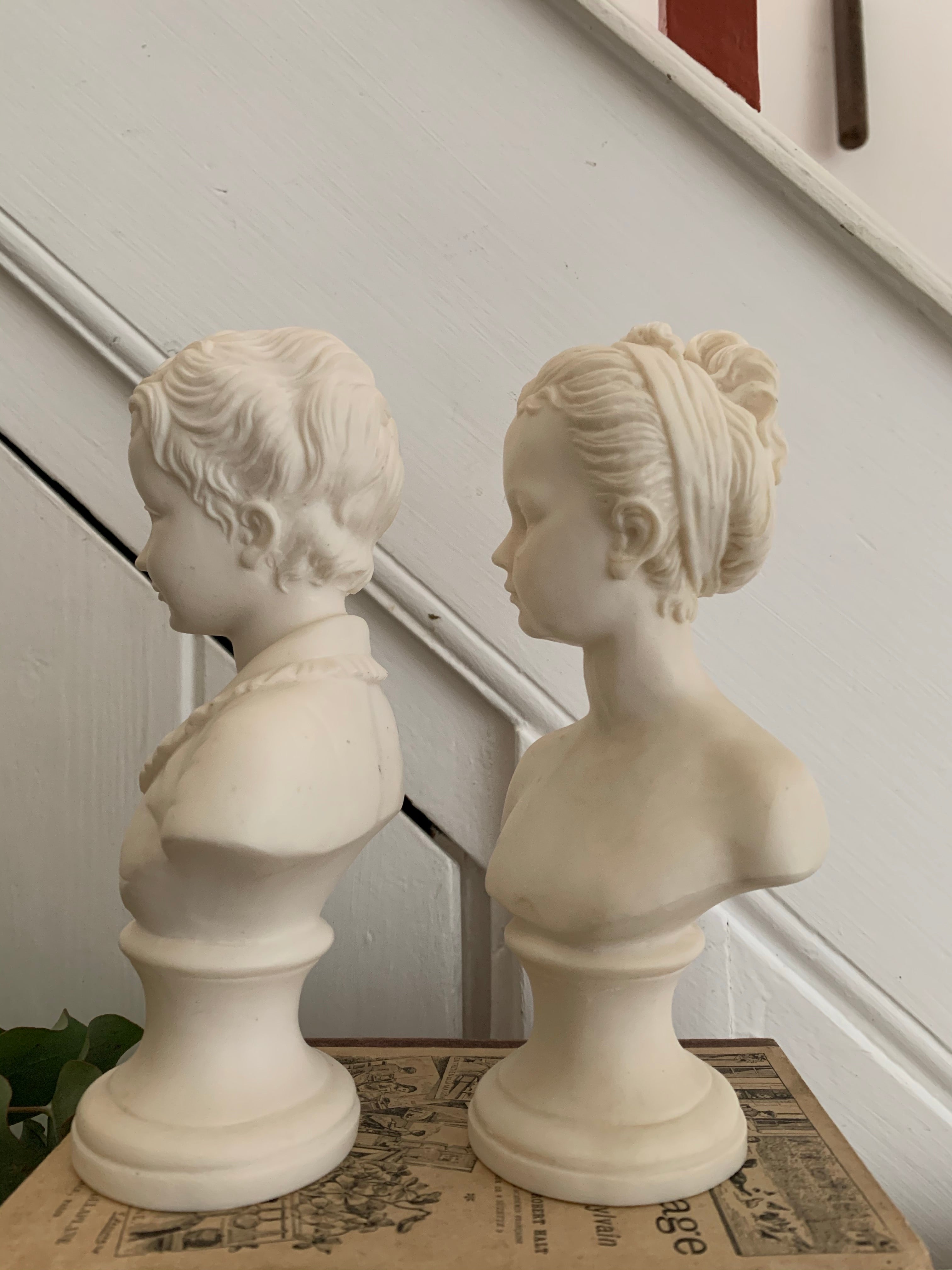 Pair of Bisque Porcelain Busts of a Parisien Boy & Girl