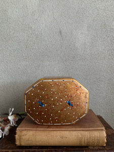 Little gold paper mache box with bird detail