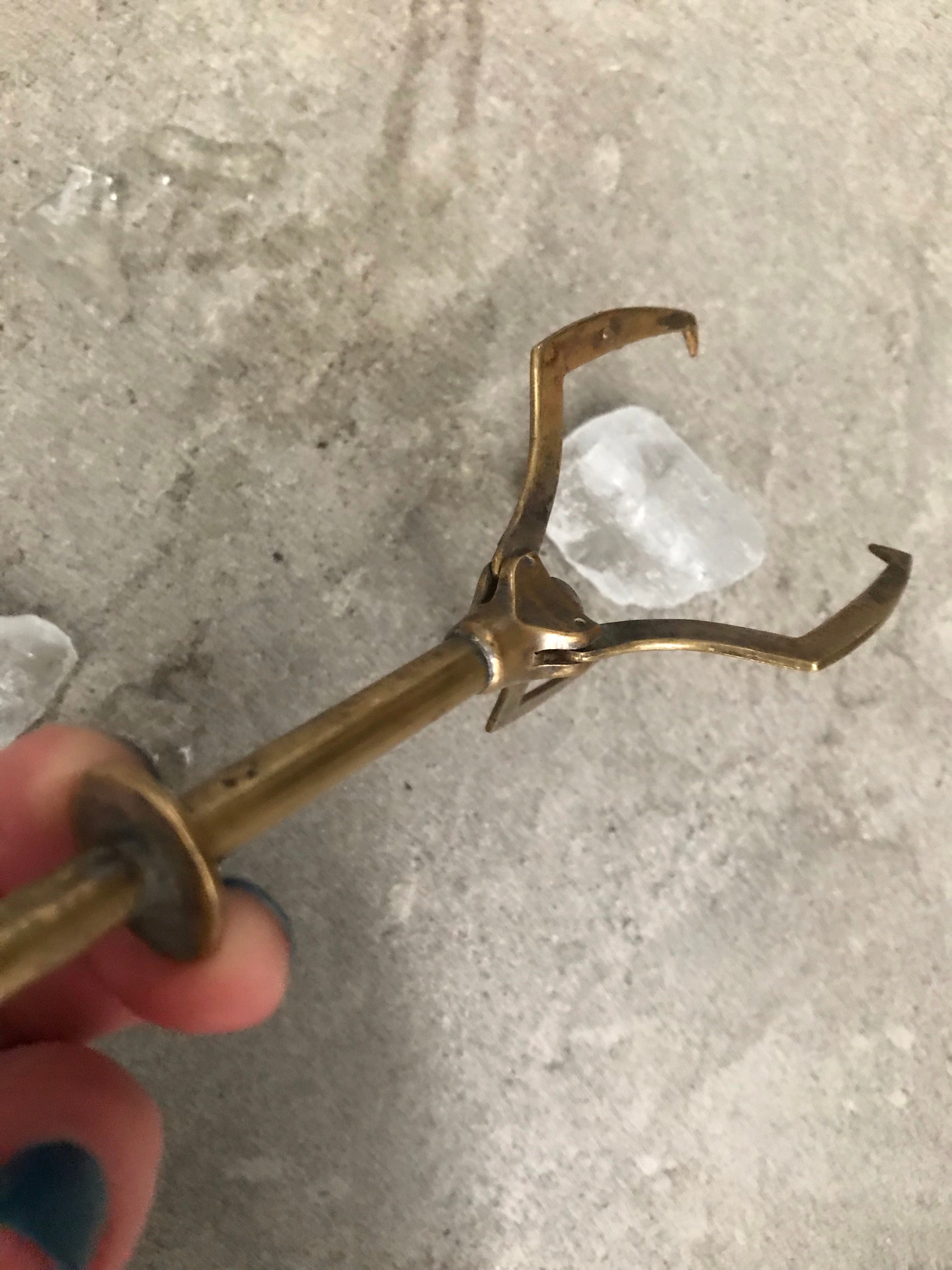 Vintage Retractable Brass Ice Claw