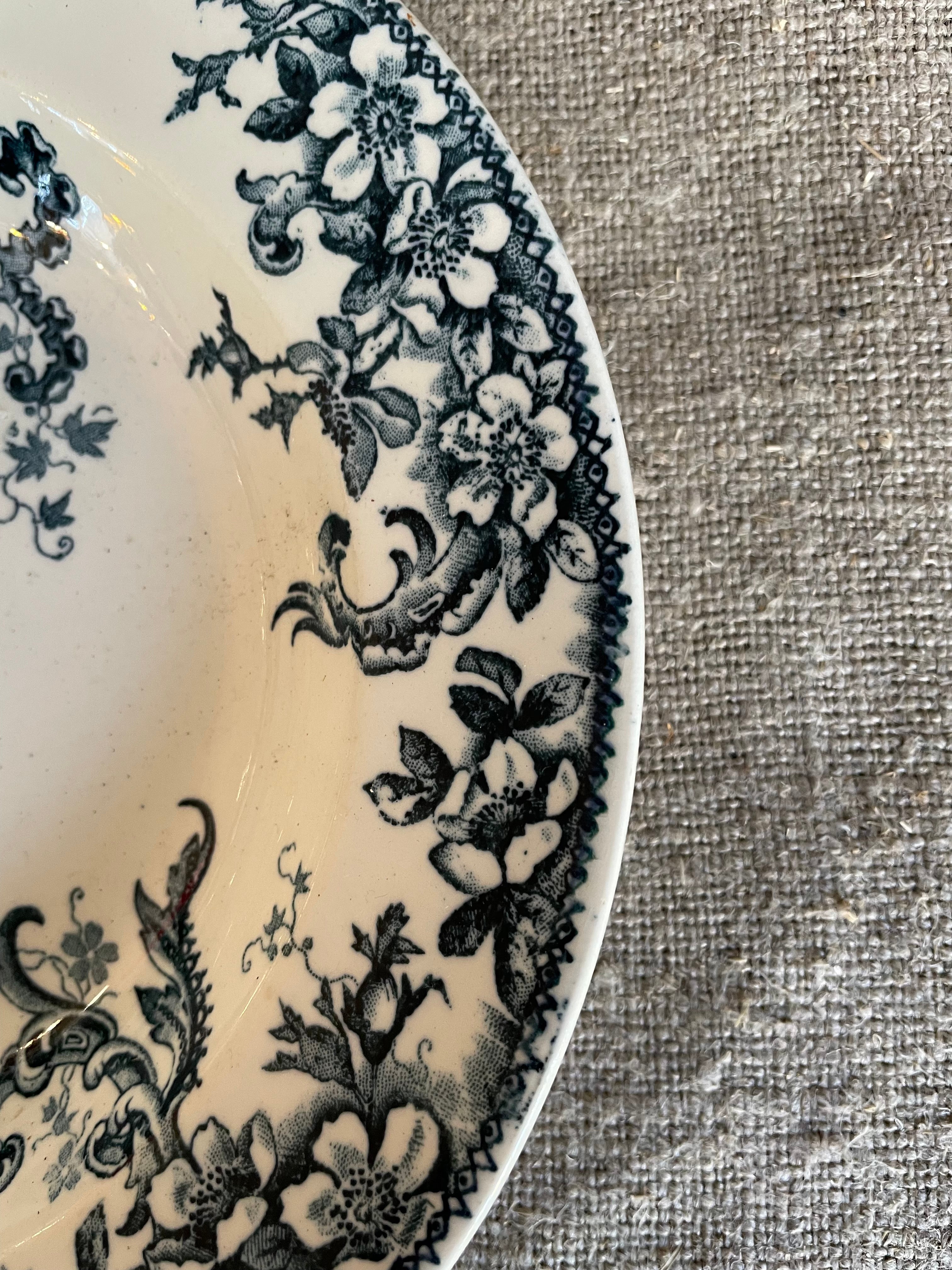 Set of four French “Wild Rose” Terre de Fer Side Plates and Bowls