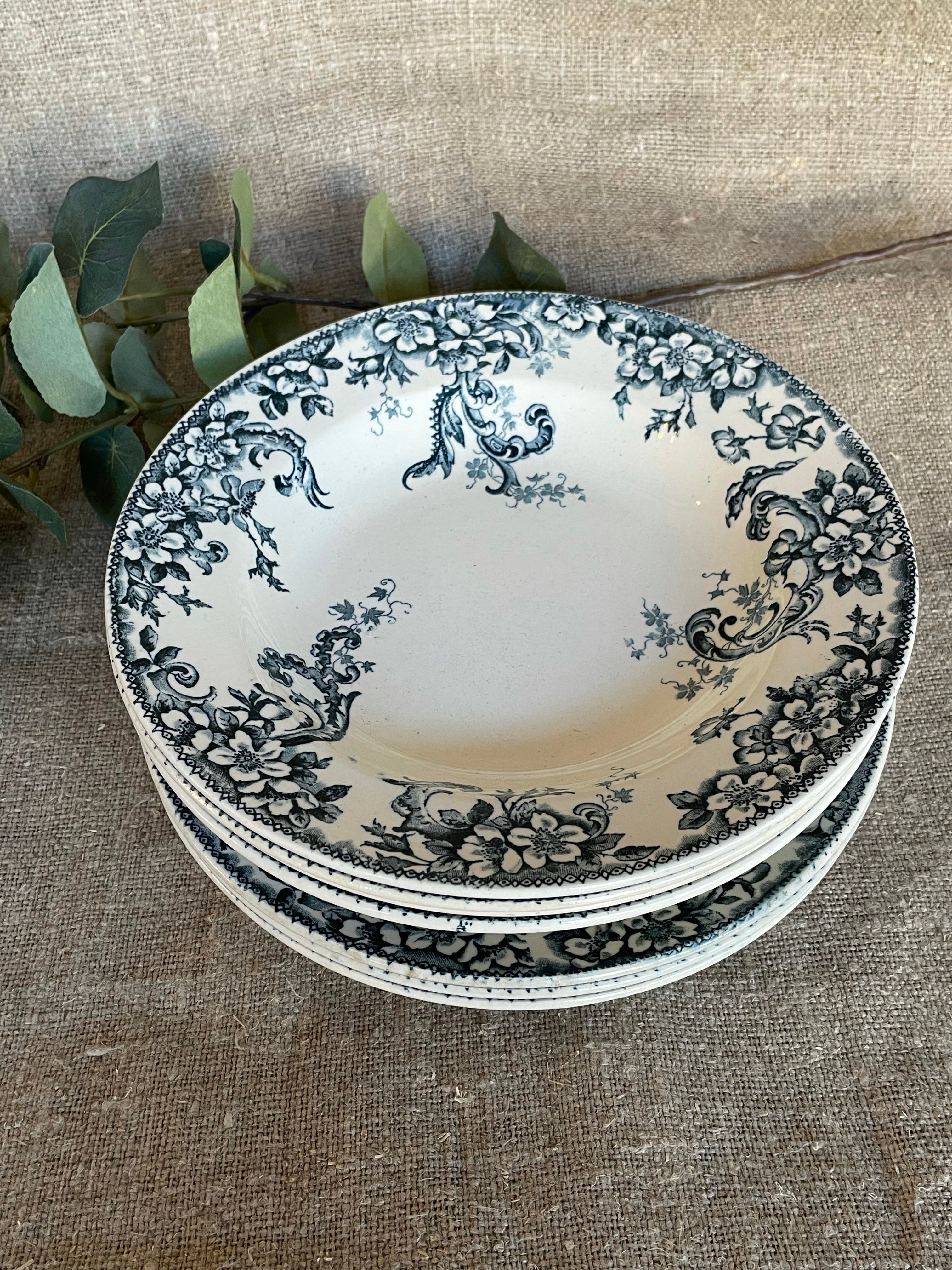 Set of four French “Wild Rose” Terre de Fer Side Plates and Bowls