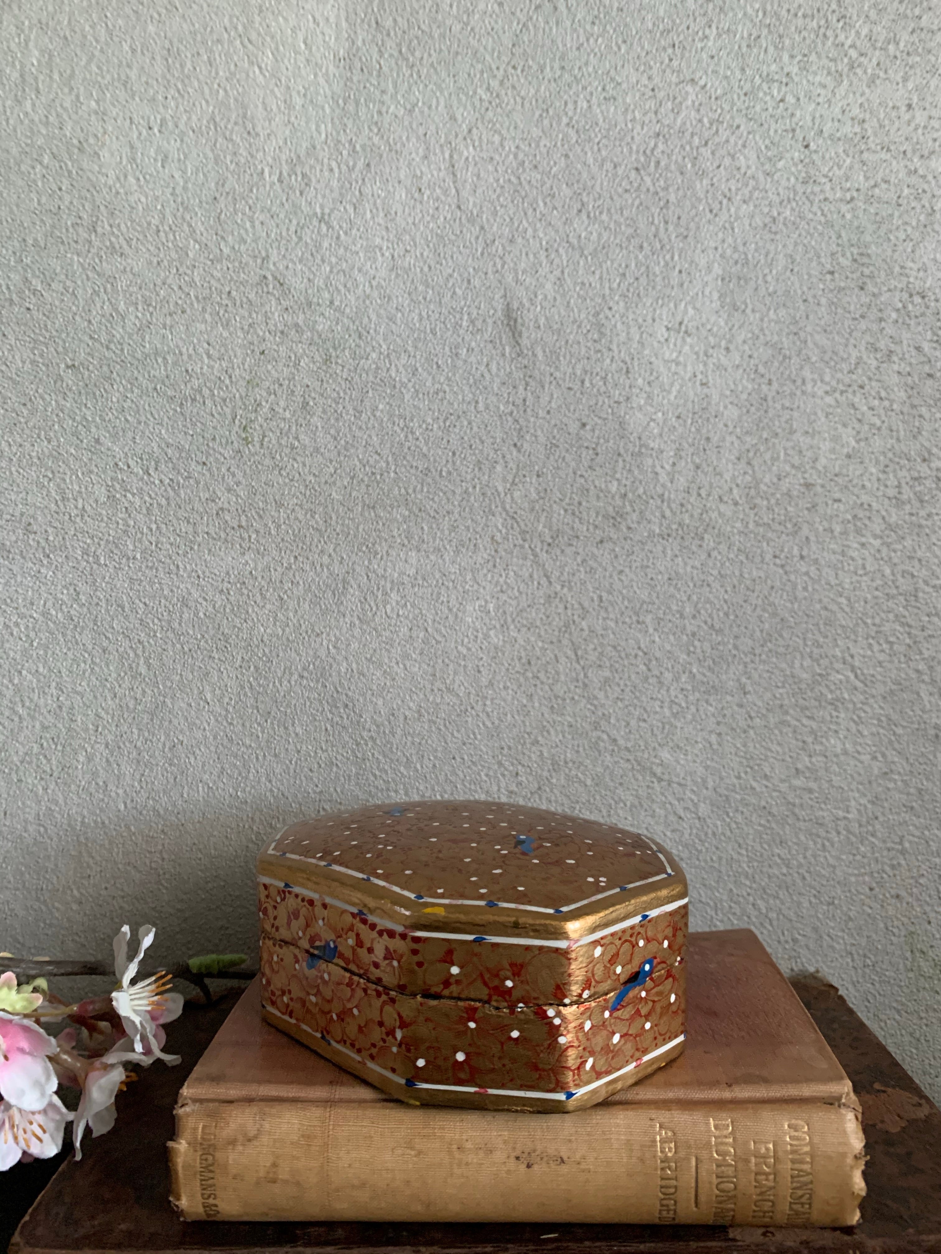 Little gold paper mache box with bird detail