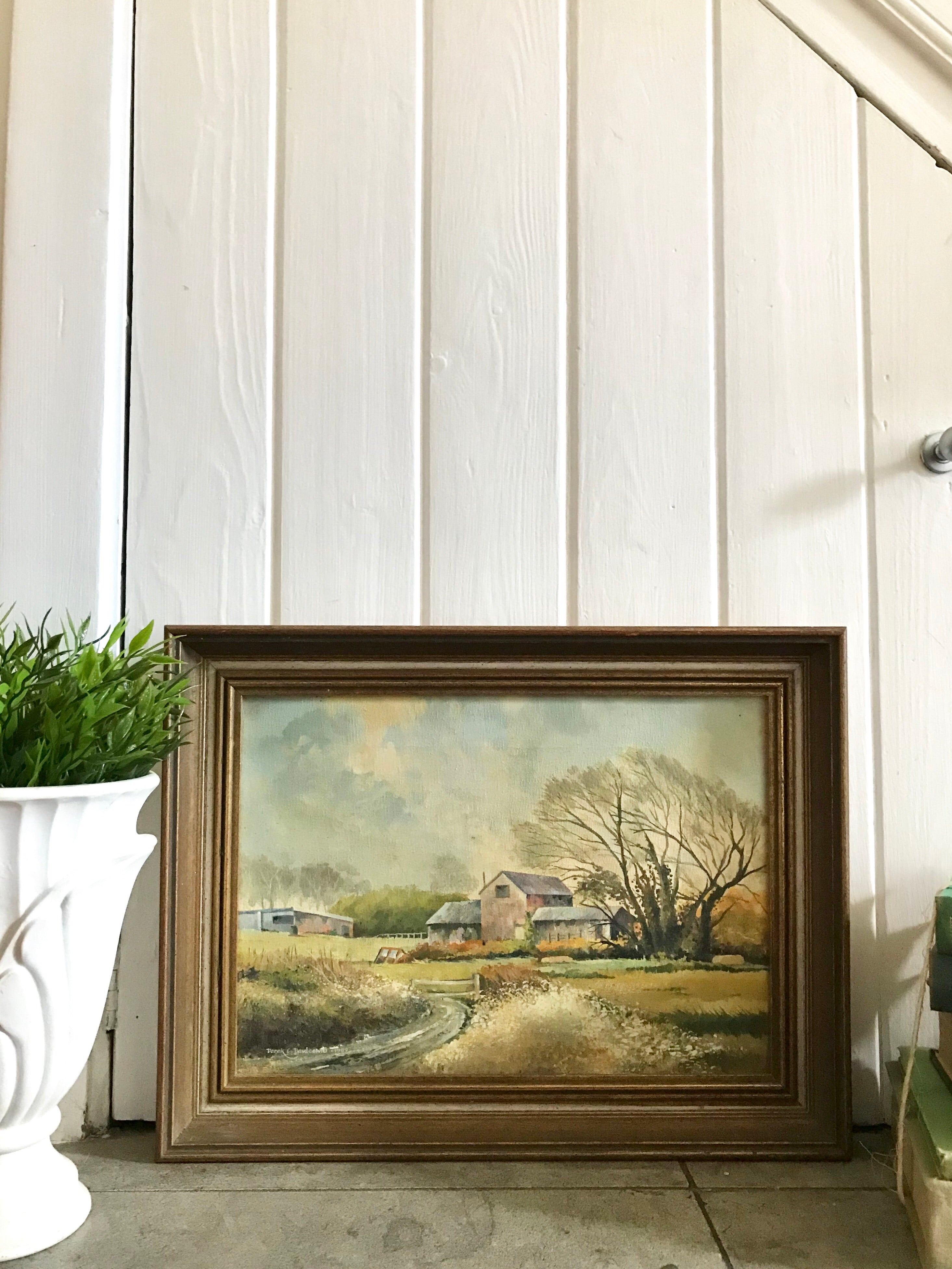 Framed canvas of farm scene and buildings