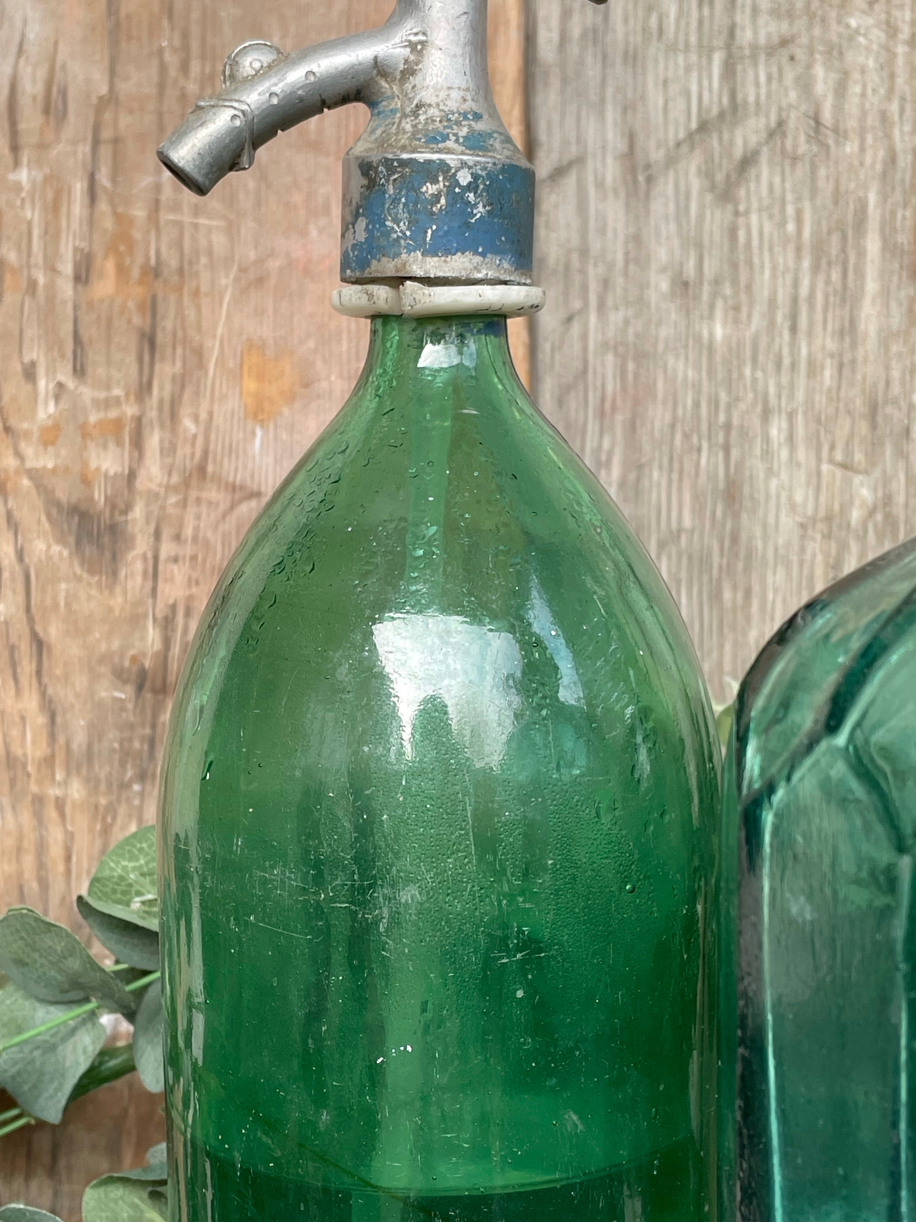 Trio of Vintage Green Soda Bottles