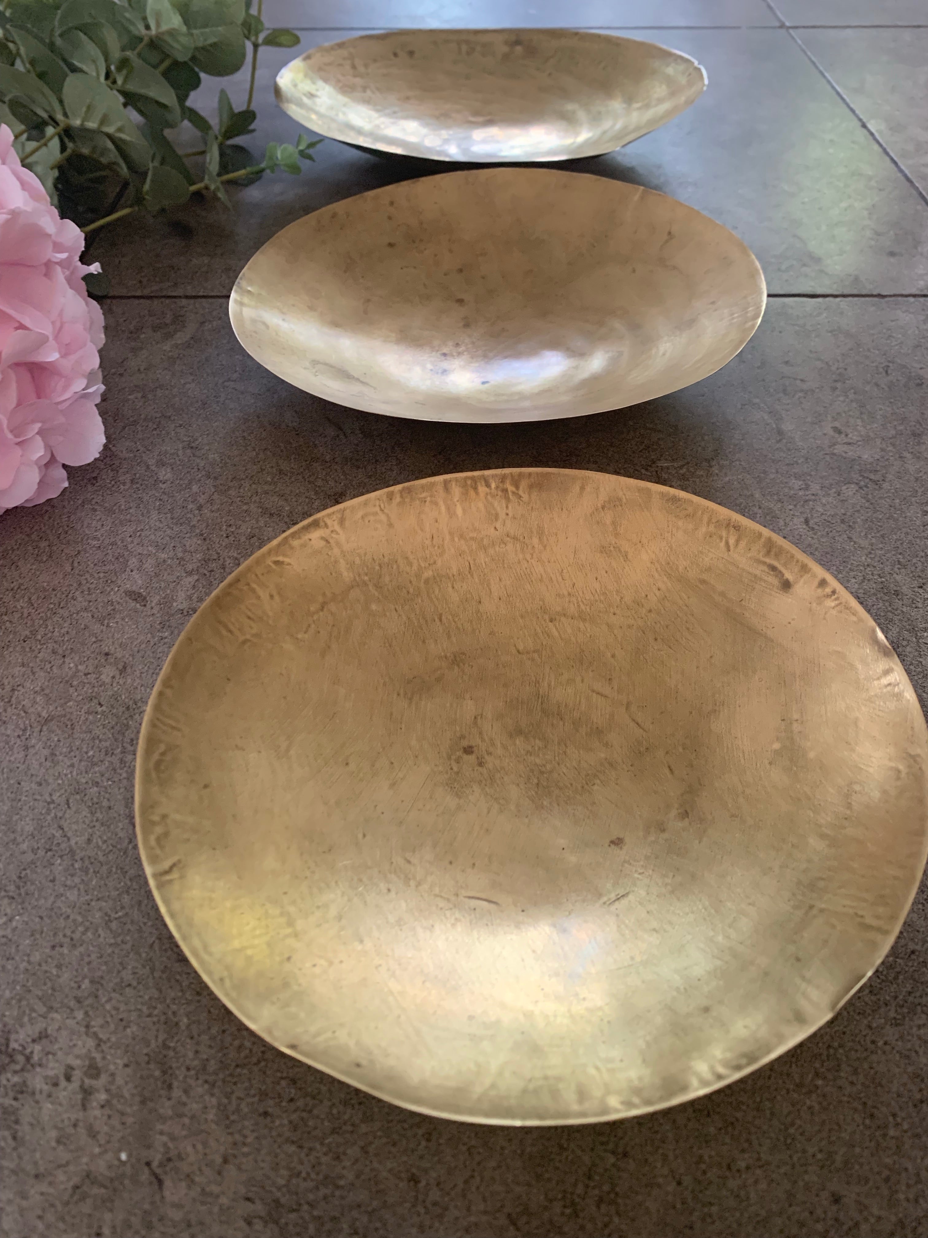 Trio of shallow vintage brass spice dishes