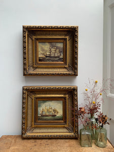 Pair of carved gilt frames with prints depicting 18th century ships