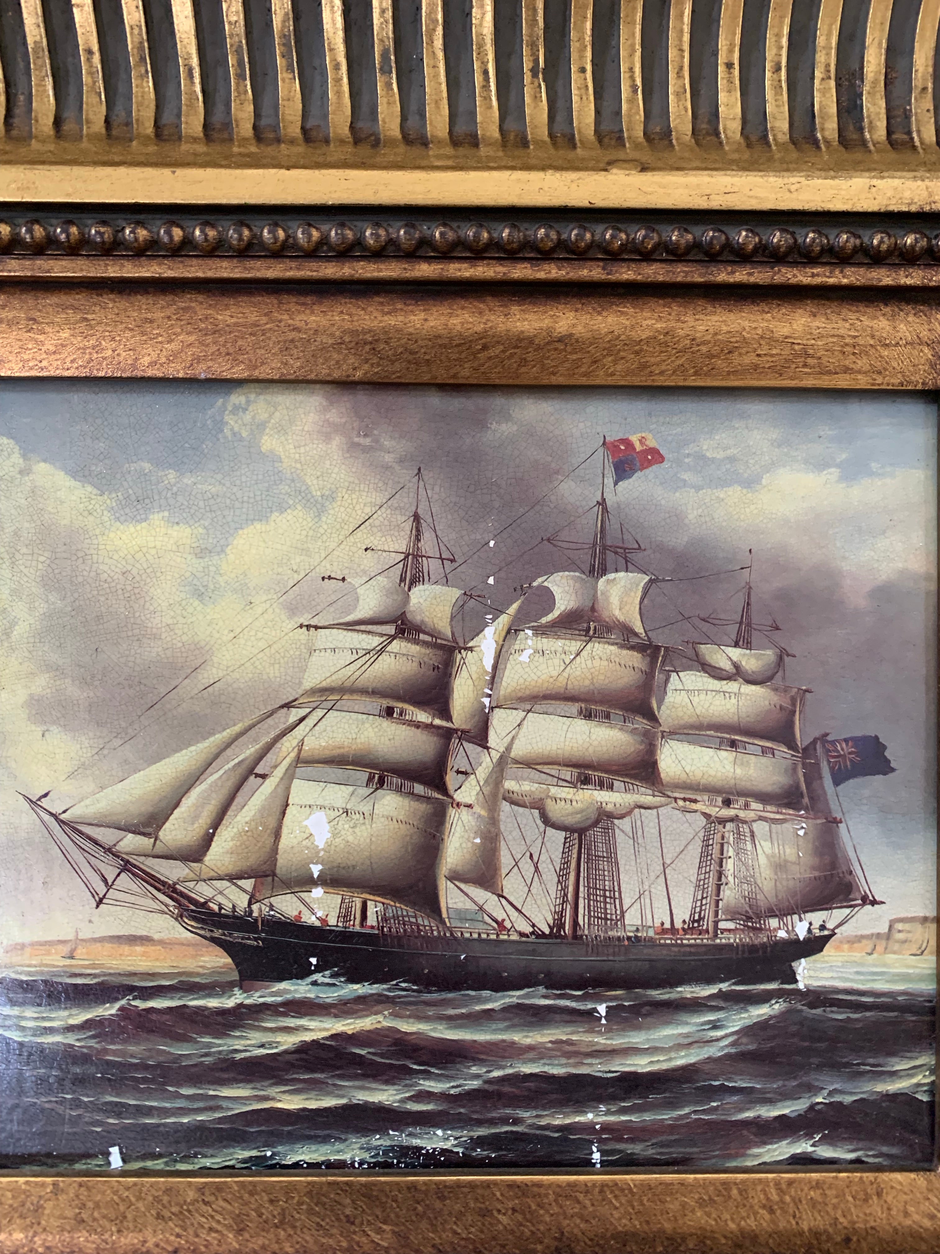 Pair of carved gilt frames with prints depicting 18th century ships
