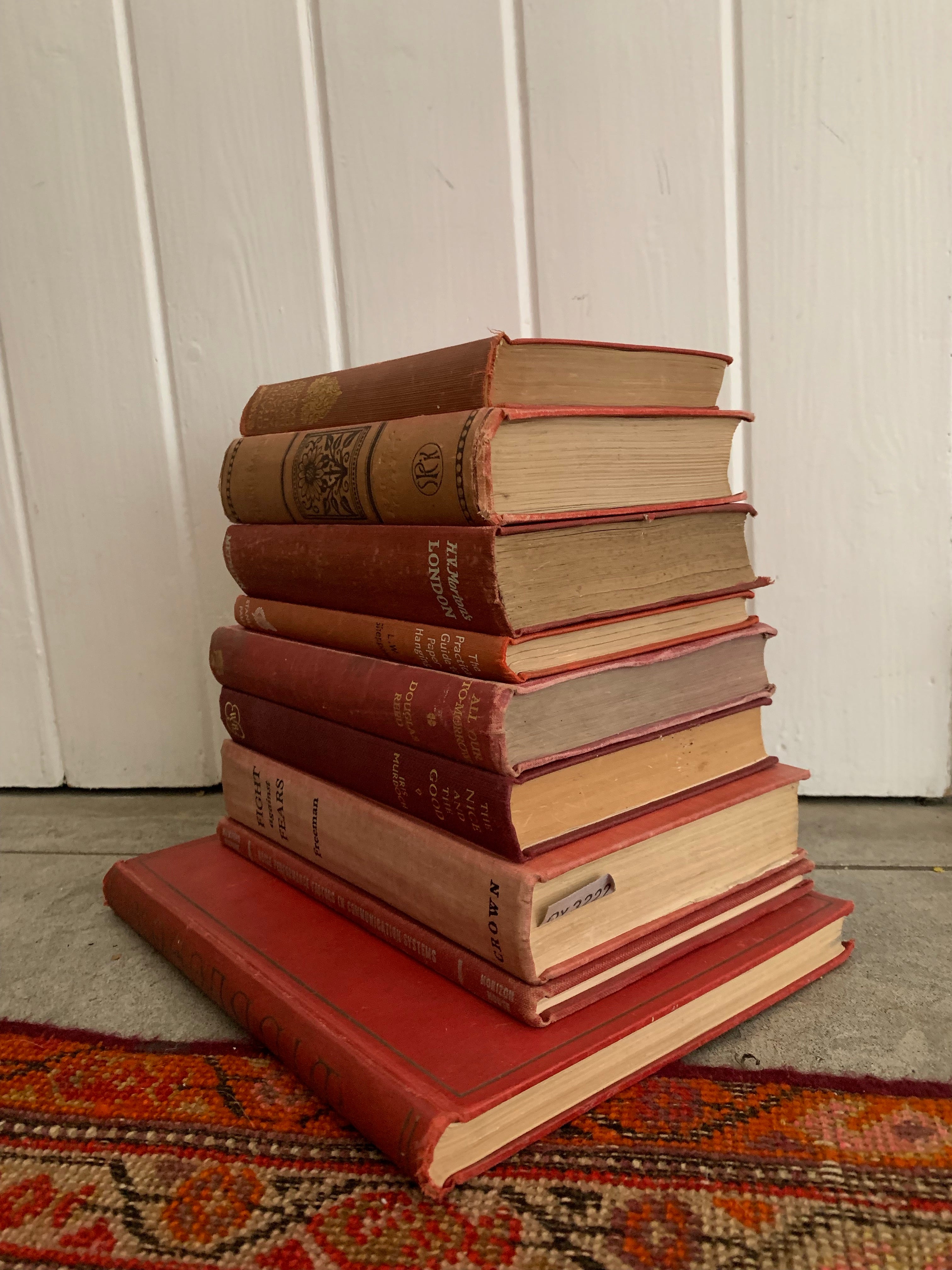 Set of 9 vintage books with red covers