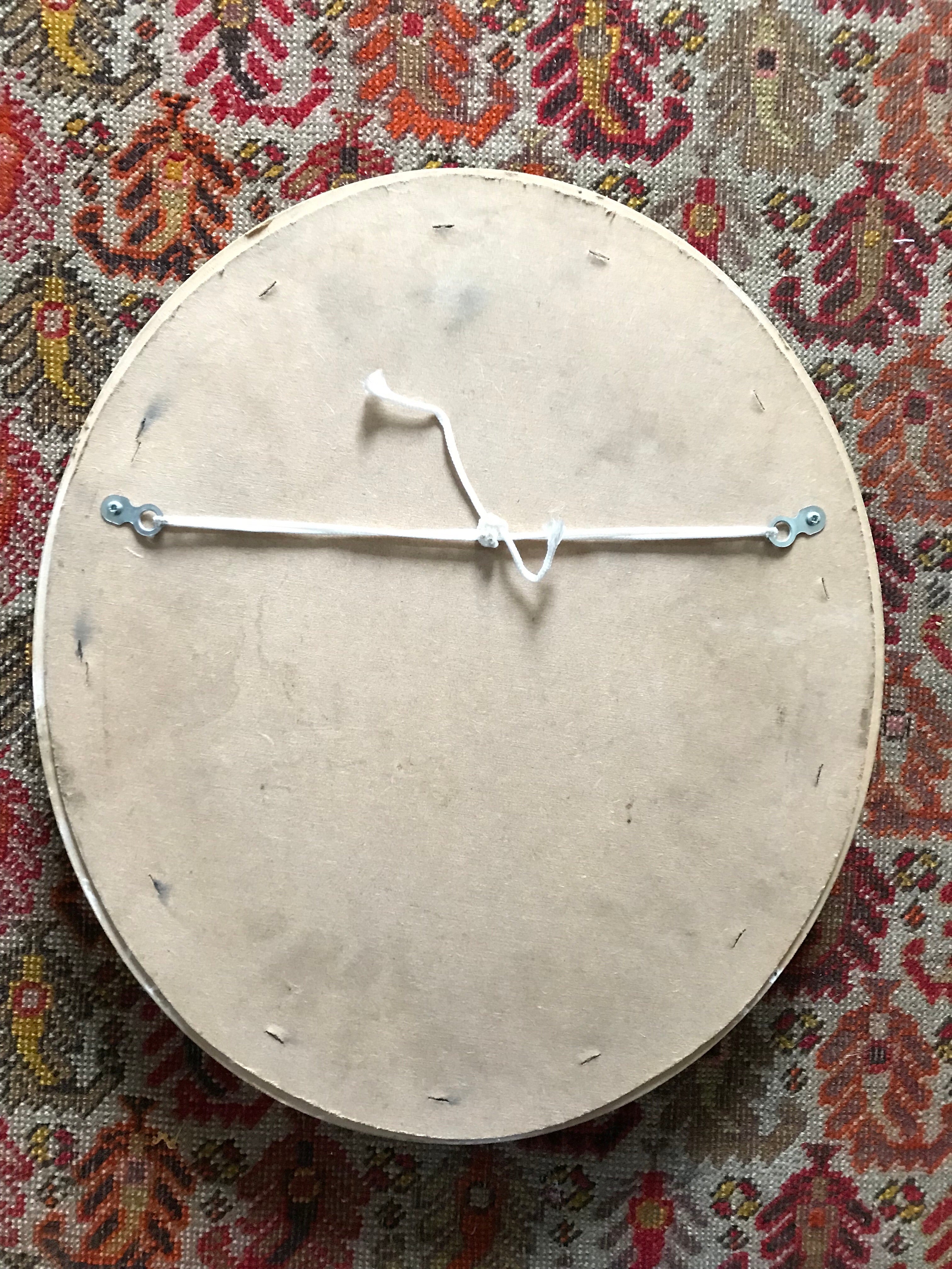 Small Oval Mirror with mottled frame and gold flecks