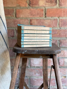 Set of Seven Penguin Books in Turquoise Hues