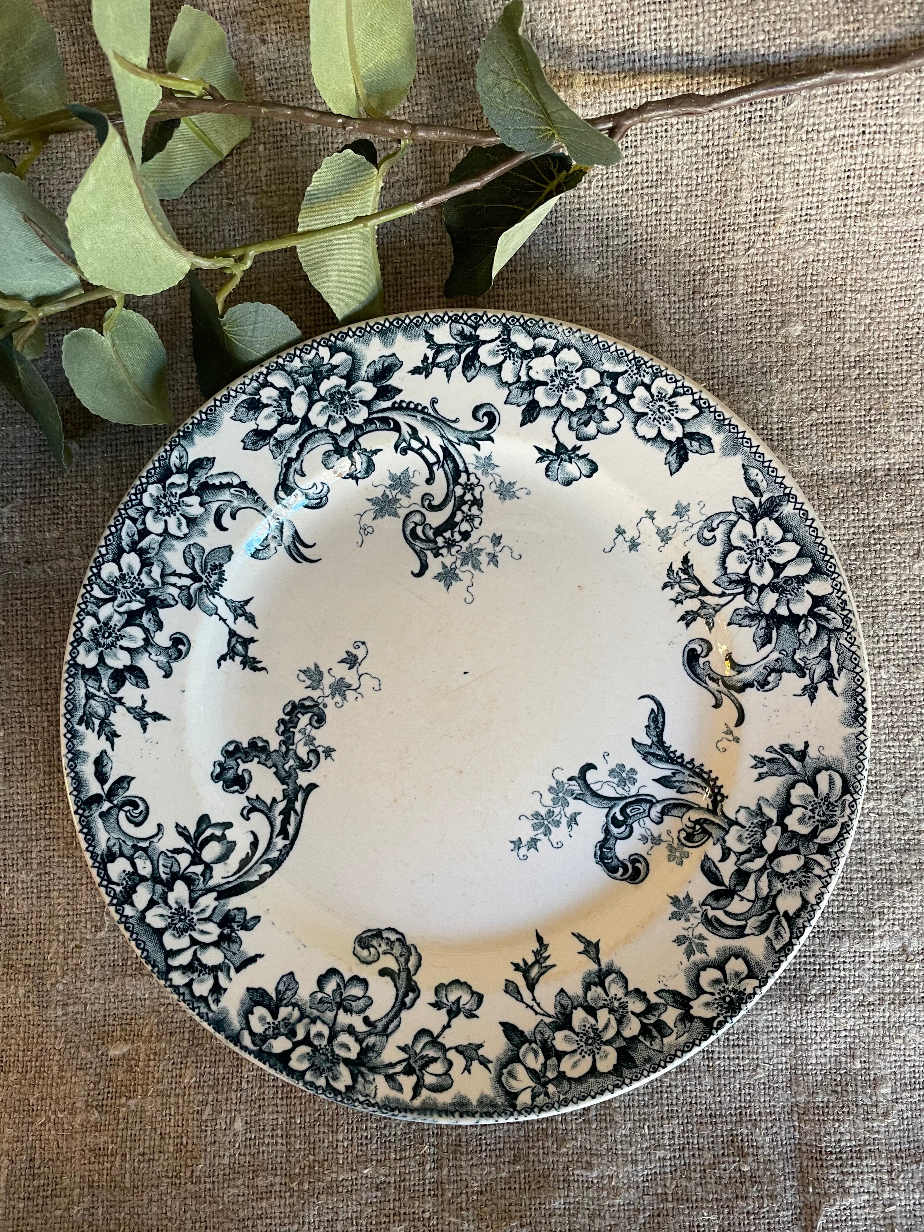 Set of four French “Wild Rose” Terre de Fer Side Plates and Bowls